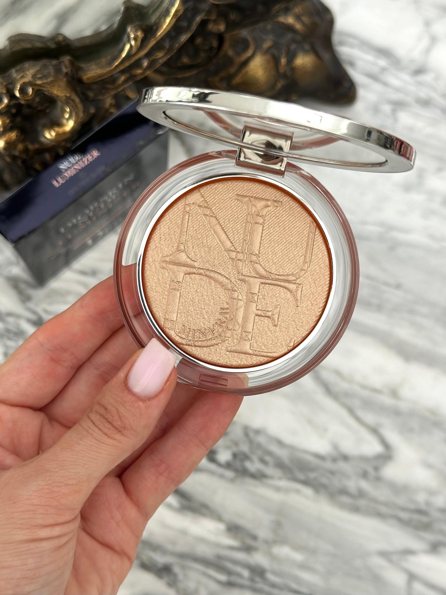 DIOR Diorskin Nude Luminizer
Highlighting Powder - Shimmering Pigments 03