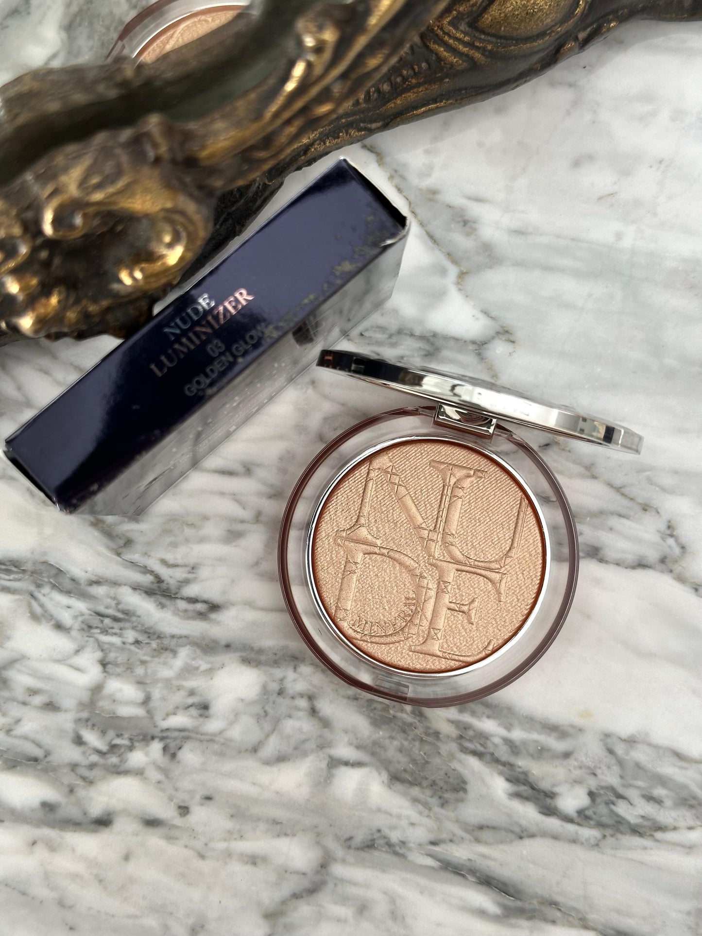 DIOR Diorskin Nude Luminizer
Highlighting Powder - Shimmering Pigments 03