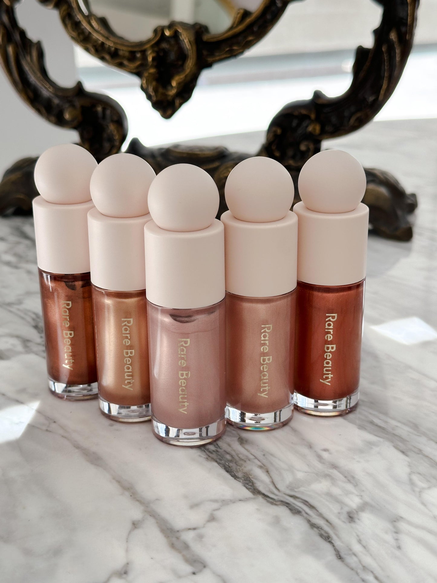 RARE BEAUTY Positive Light Liquid Luminizer - Captivate