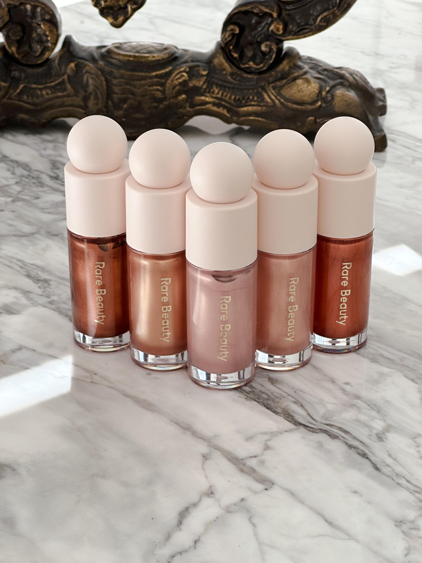 RARE BEAUTY Positive Light Liquid Luminizer - Captivate