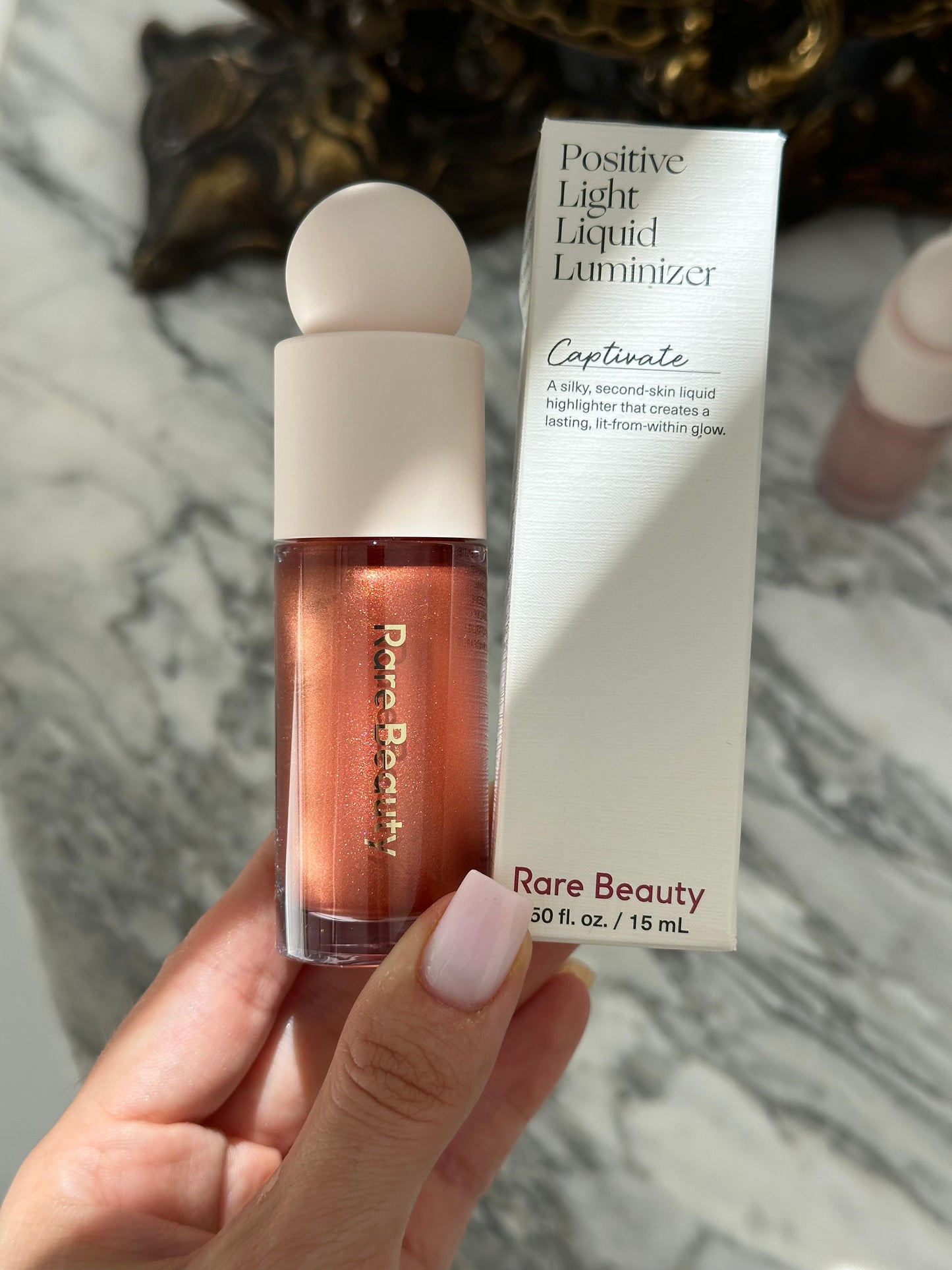 RARE BEAUTY Positive Light Liquid Luminizer - Captivate