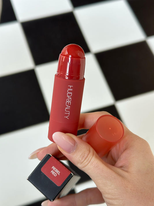 HUDA BEAUTY Cheeky Tint Blush Stick - Rebel Red