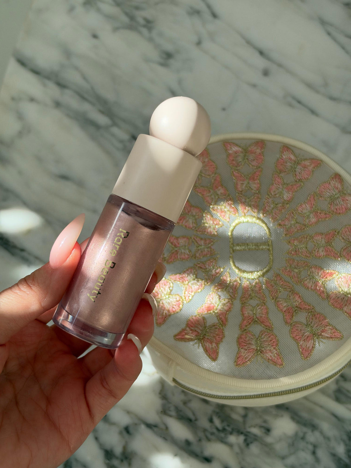 RARE BEAUTY Positive Light Liquid Luminizer - Enchant
