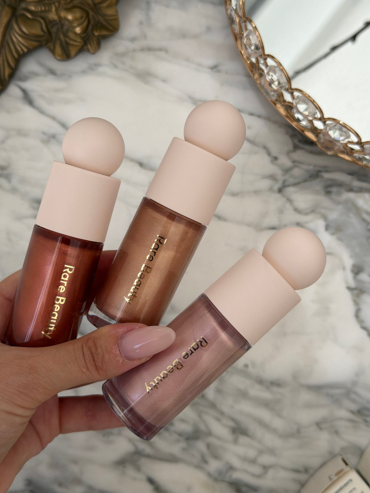 RARE BEAUTY Positive Light Liquid Luminizer - Flaunt