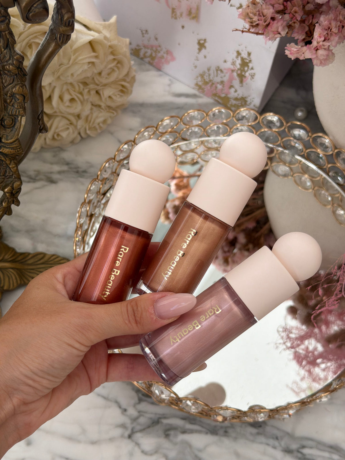 RARE BEAUTY Positive Light Liquid Luminizer - Enchant