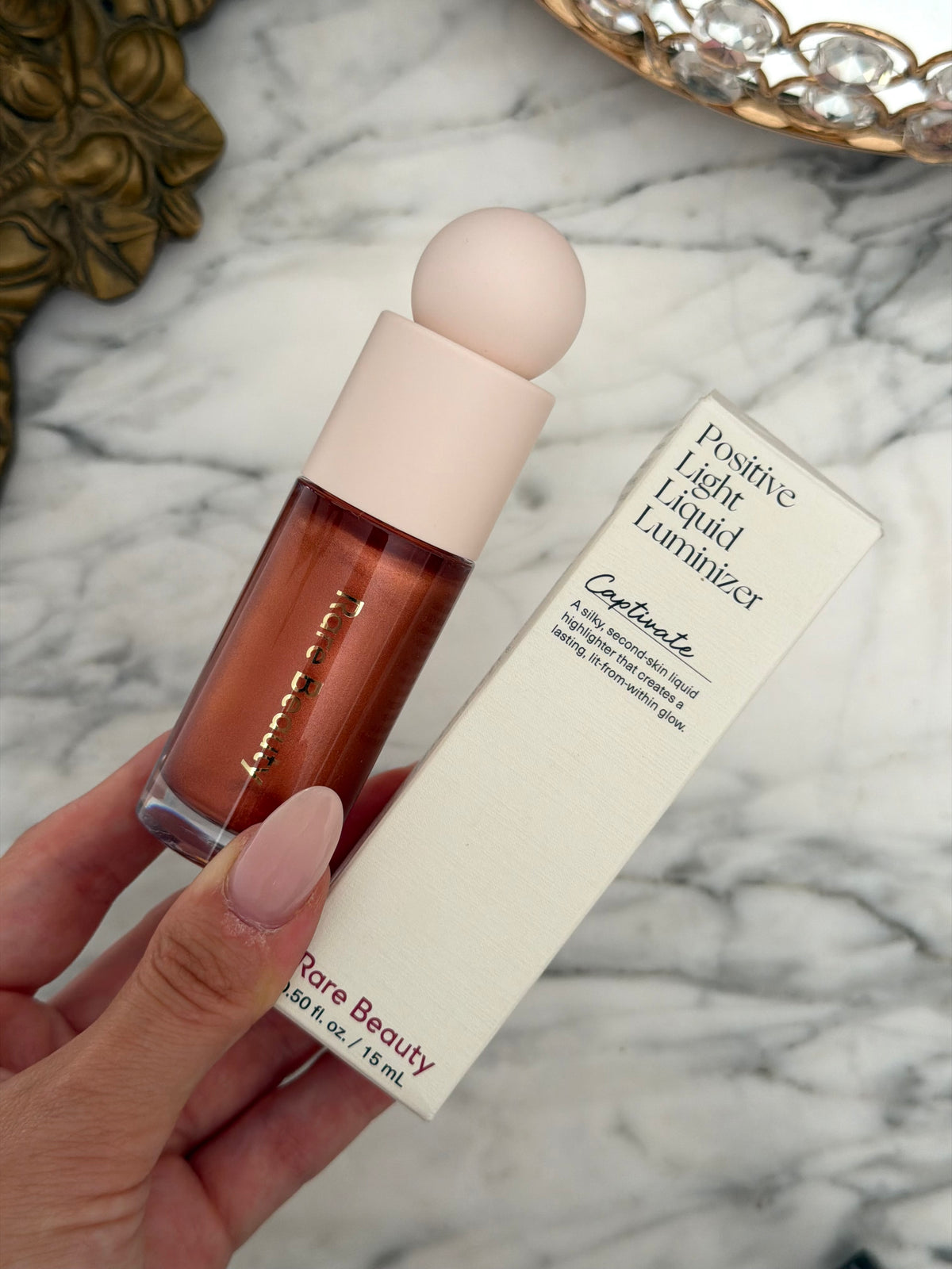 RARE BEAUTY Positive Light Liquid Luminizer - Captivate