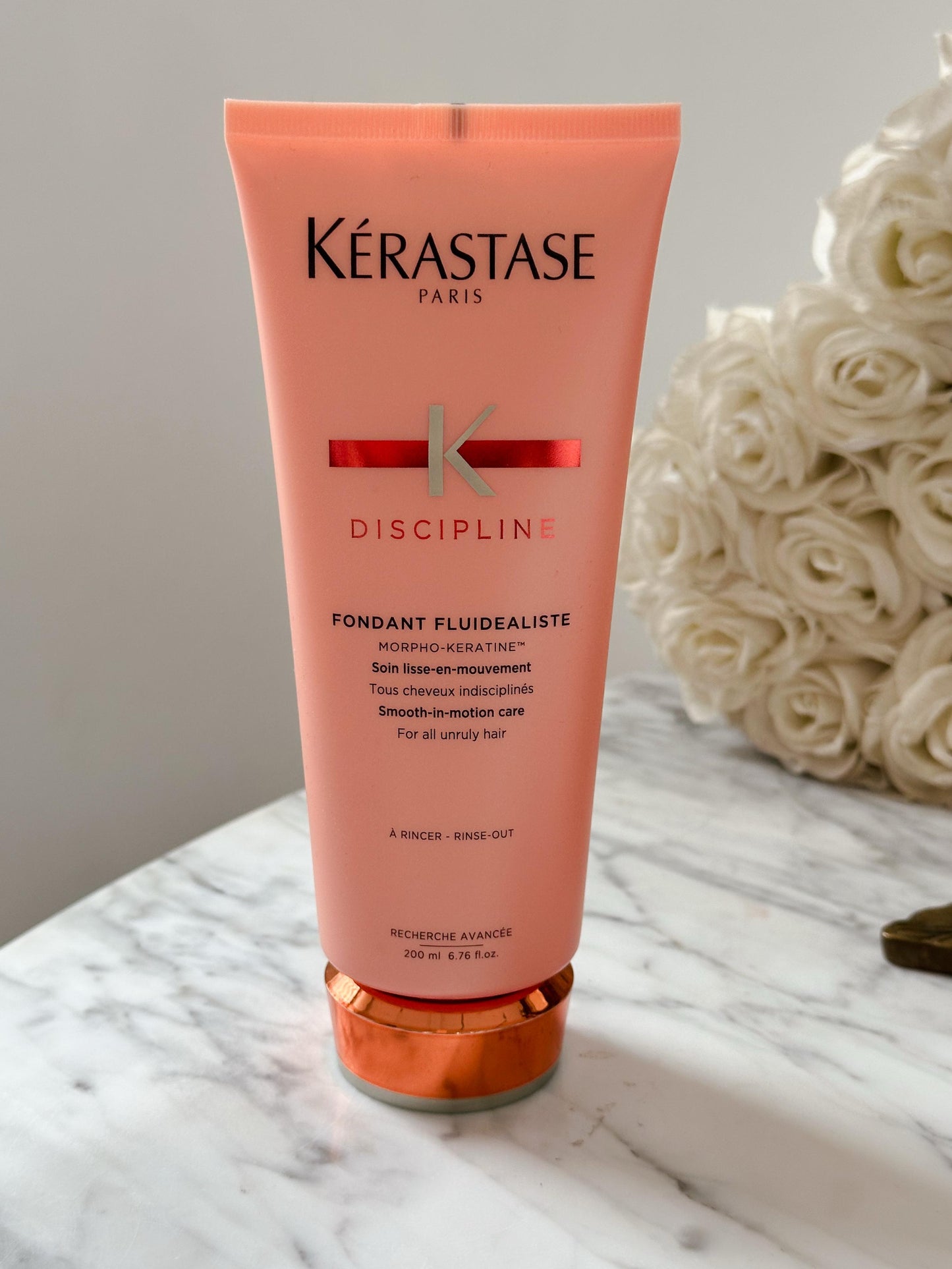 KÉRASTASE Discipline Fluidealiste
Smoothing Conditioner for Frizzy Hair
