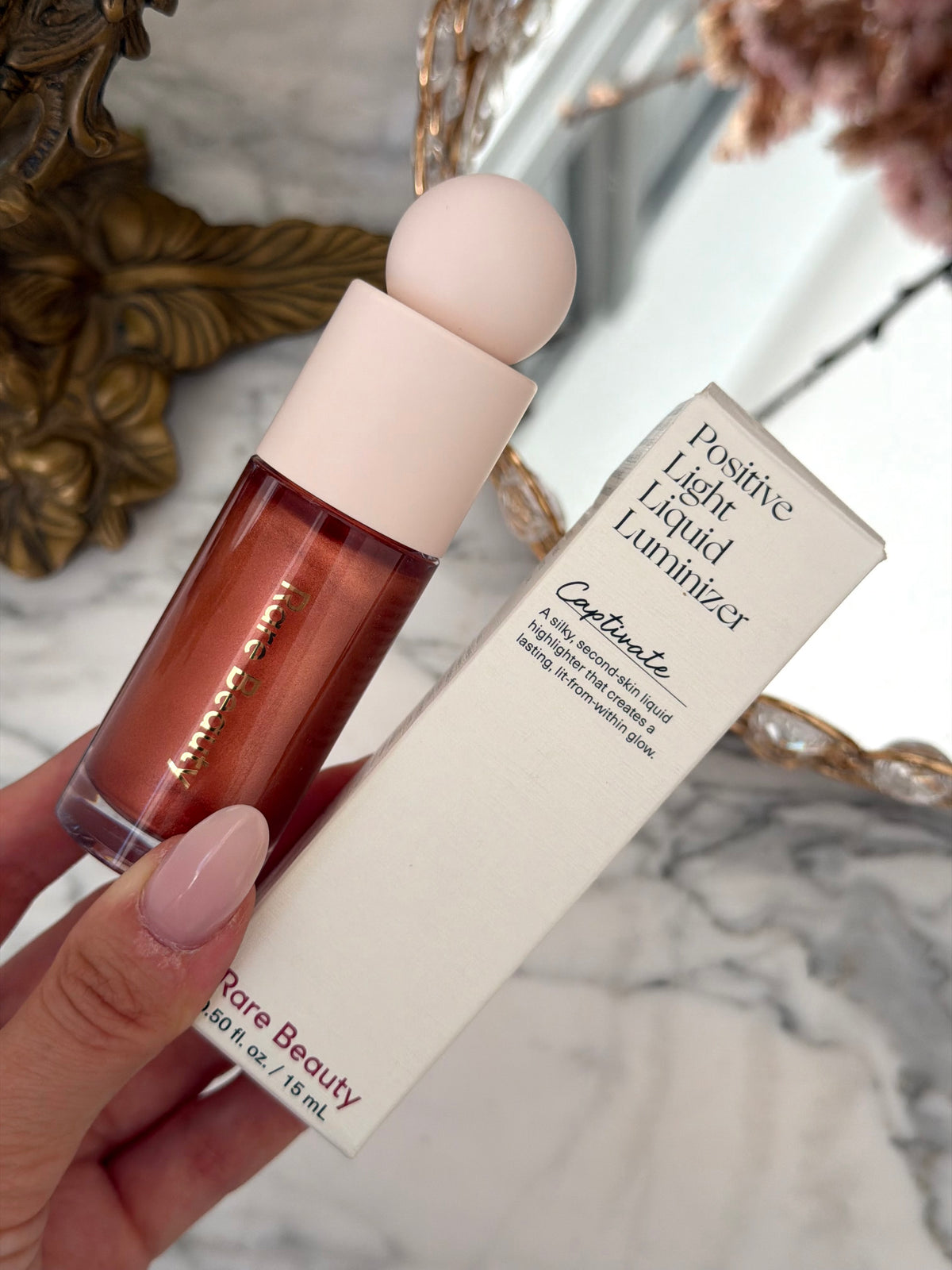 RARE BEAUTY Positive Light Liquid Luminizer - Captivate