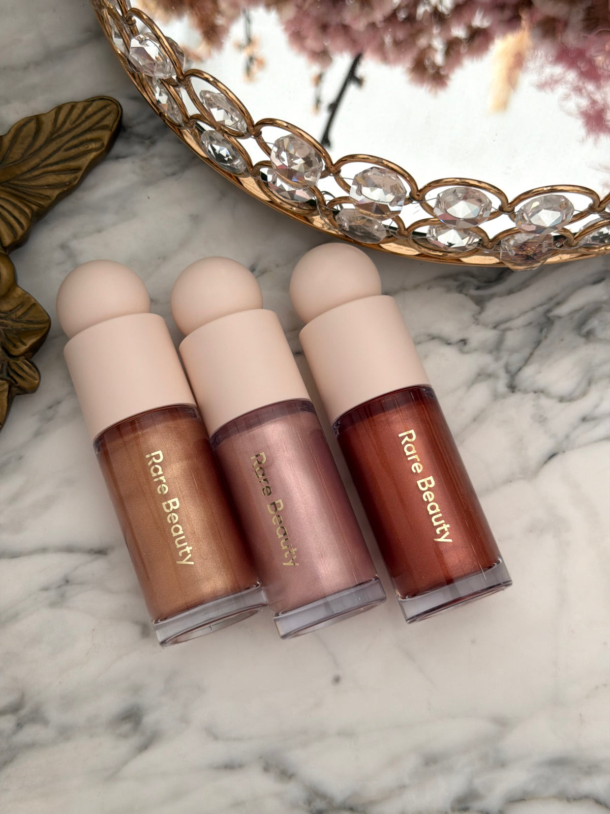RARE BEAUTY Positive Light Liquid Luminizer - Captivate