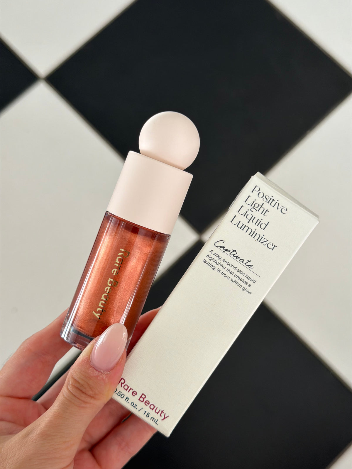 RARE BEAUTY Positive Light Liquid Luminizer - Captivate