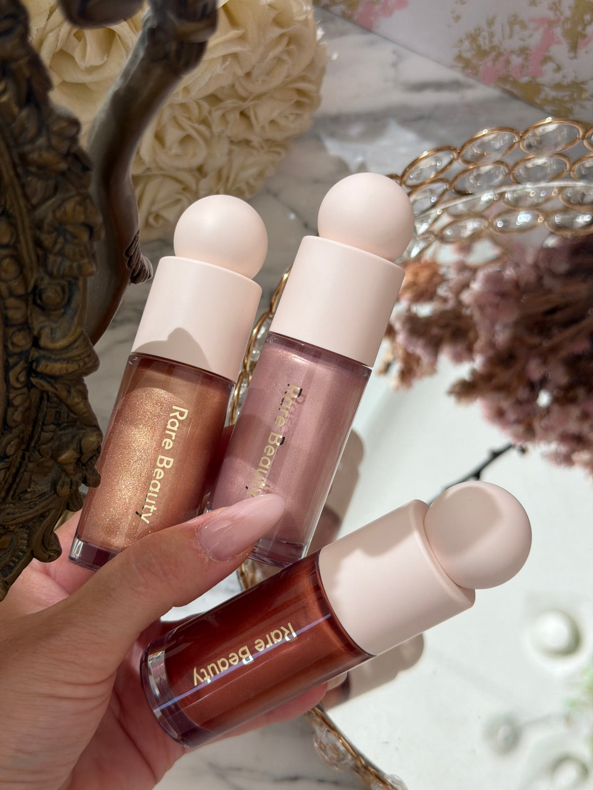 RARE BEAUTY Positive Light Liquid Luminizer - Enchant