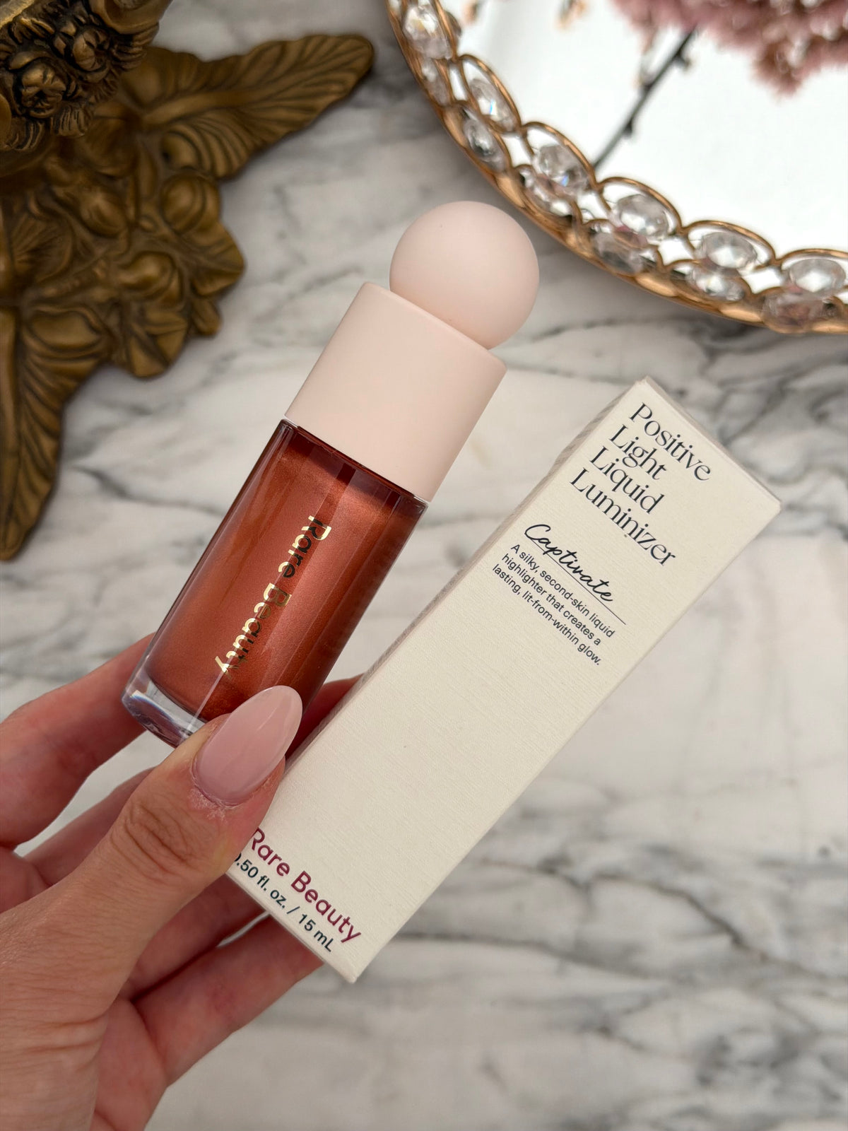 RARE BEAUTY Positive Light Liquid Luminizer - Captivate