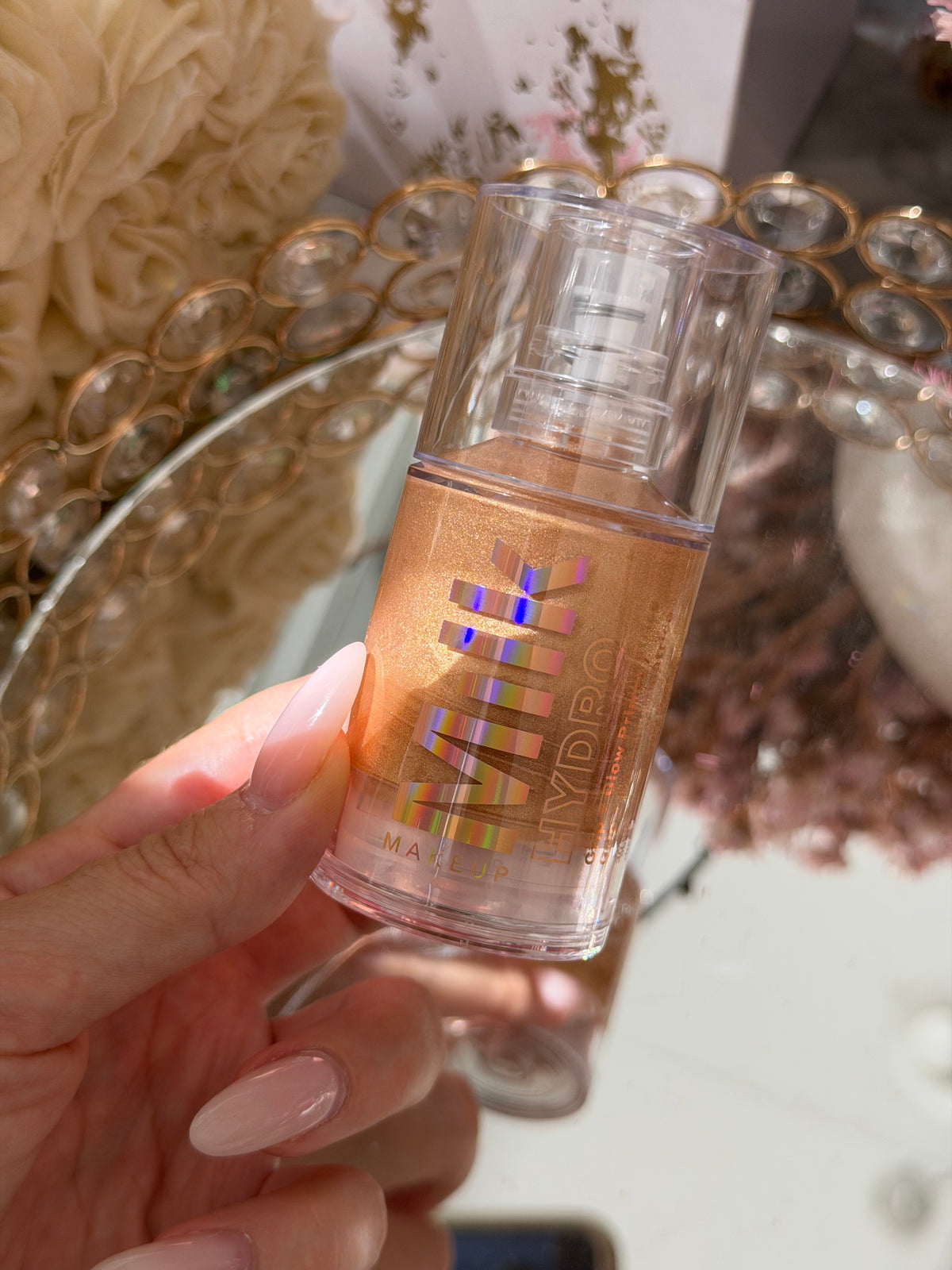 MILK MAKEUP Hydro Grip + Glow Primer
Illuminating Primer