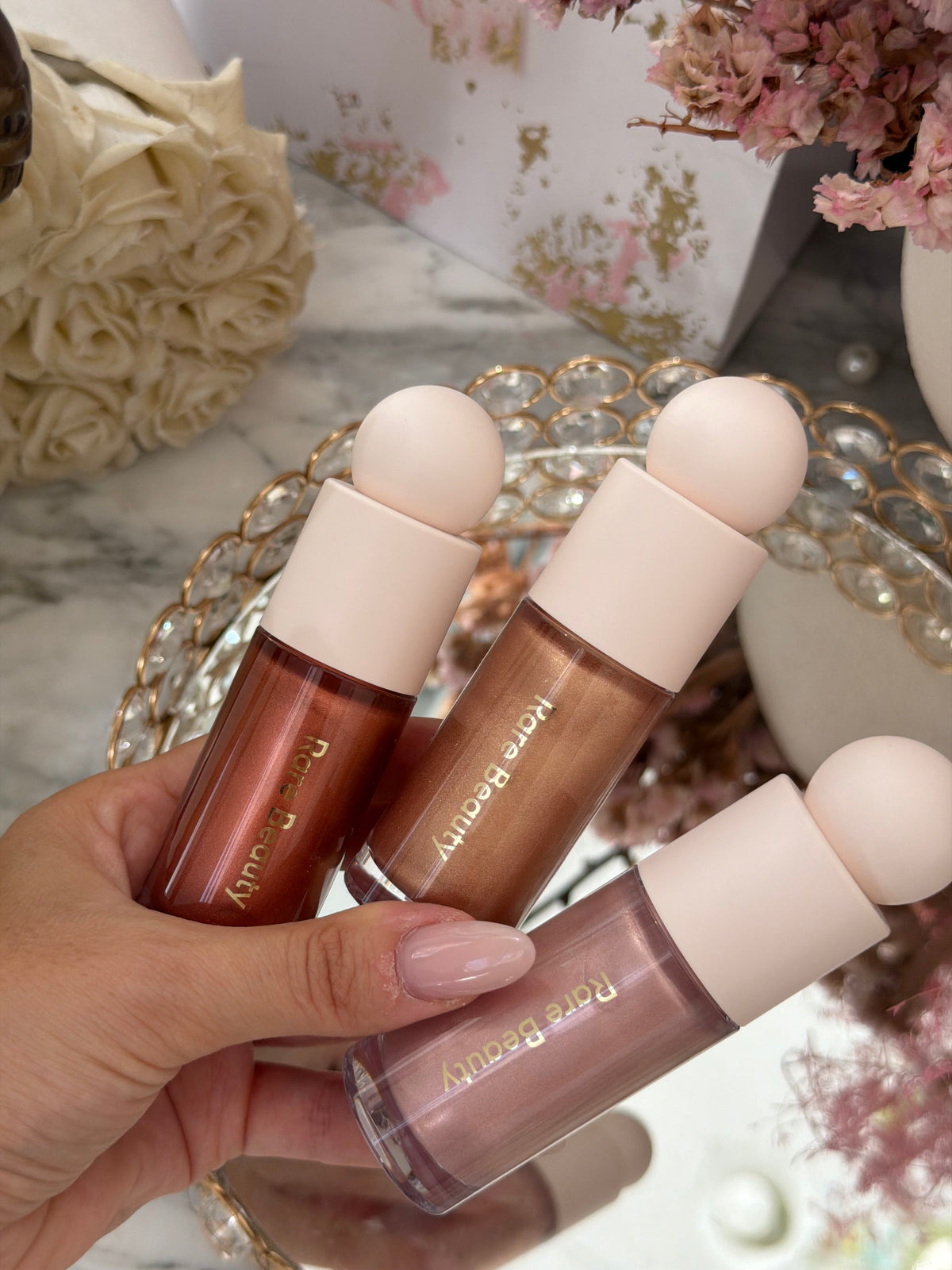 RARE BEAUTY Positive Light Liquid Luminizer - Captivate