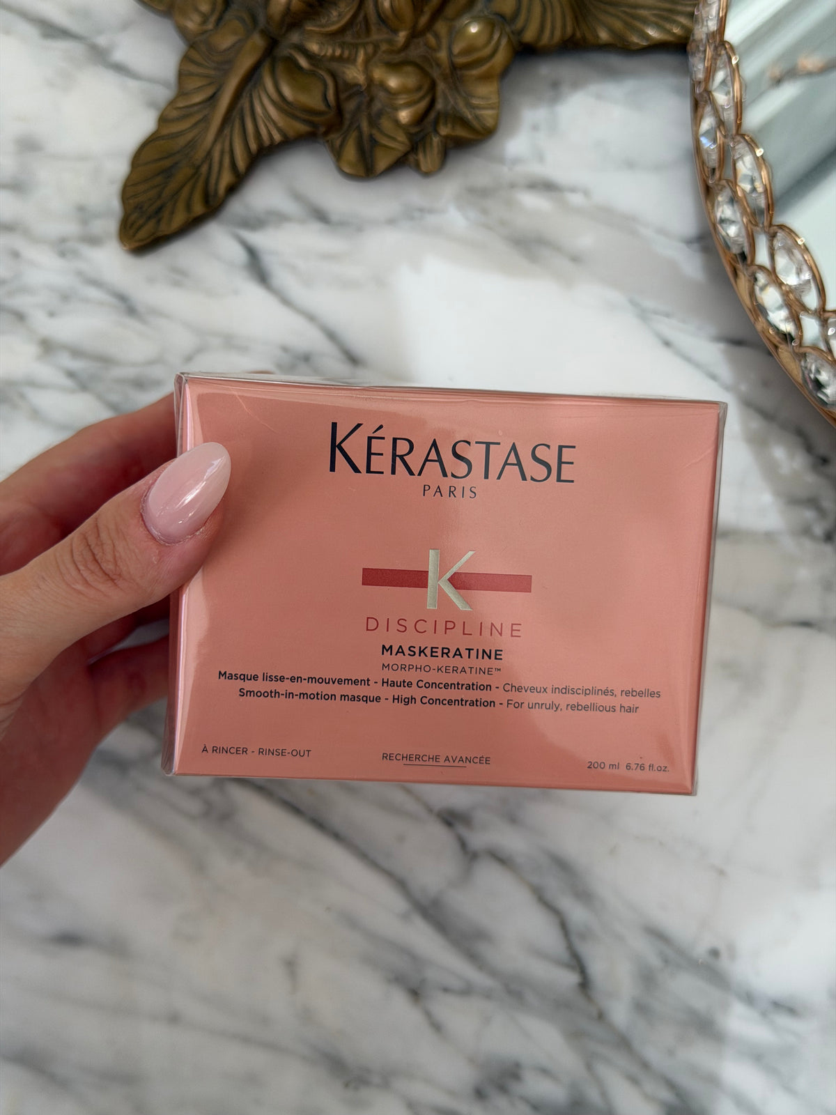 KÉRASTASE Discipline
Maskeratine Hair Mask
Smoothing Mask Providing Fluidity, Movement And Softness For Frizzy Hair