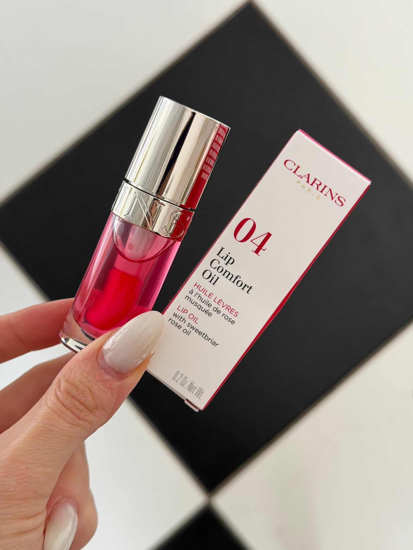 CLARINS Lip Comfort Oil With Sweetbriar (04)