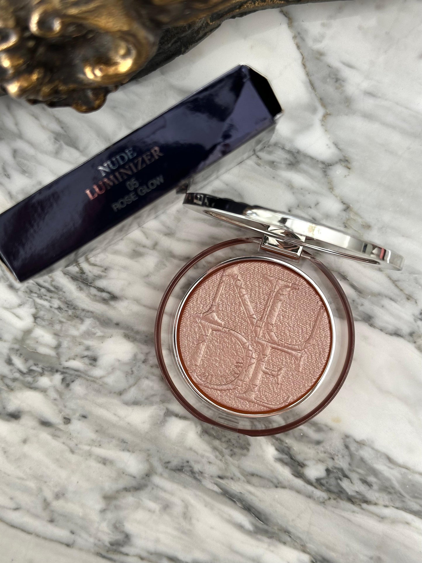 DIOR Diorskin Nude Luminizer
Highlighting Powder - Shimmering Pigments 05