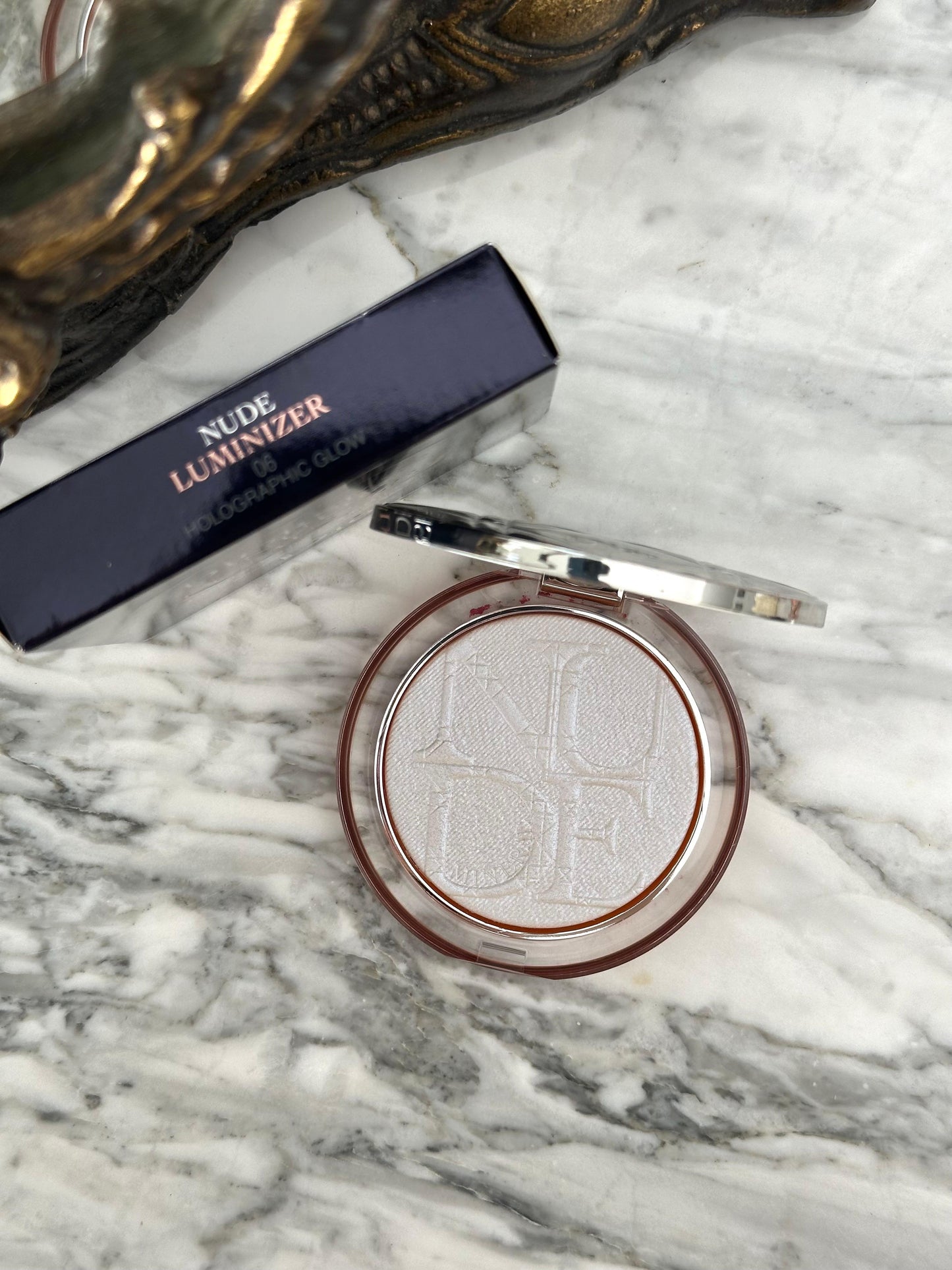 DIOR Diorskin Nude Luminizer
Highlighting Powder - Shimmering Pigments 06