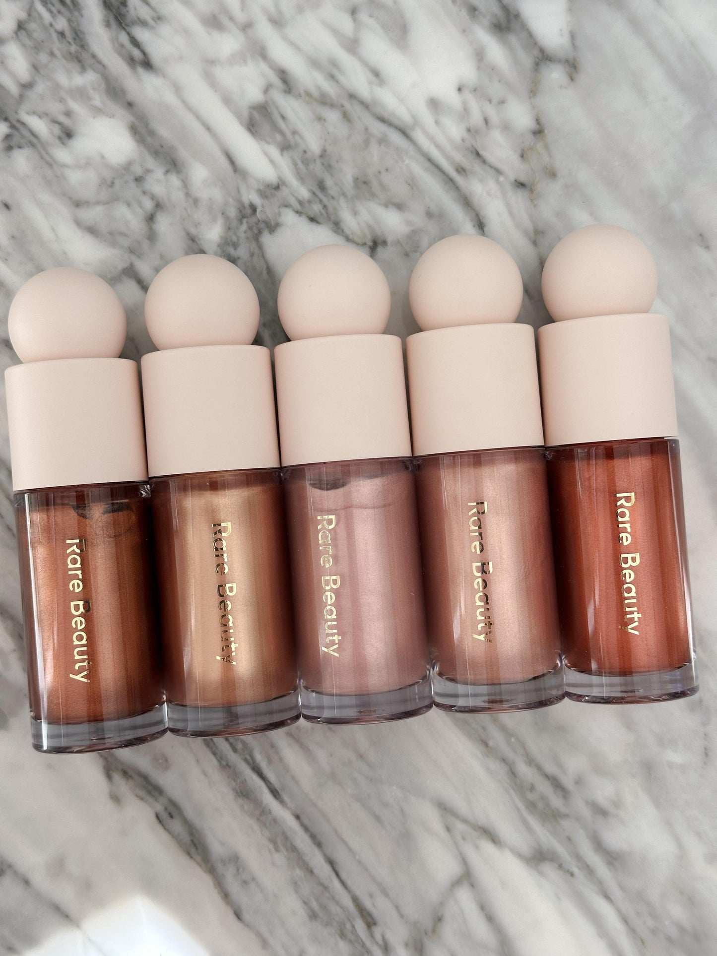 RARE BEAUTY Positive Light Liquid Luminizer - Enchant