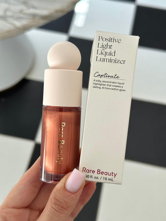RARE BEAUTY Positive Light Liquid Luminizer - Captivate