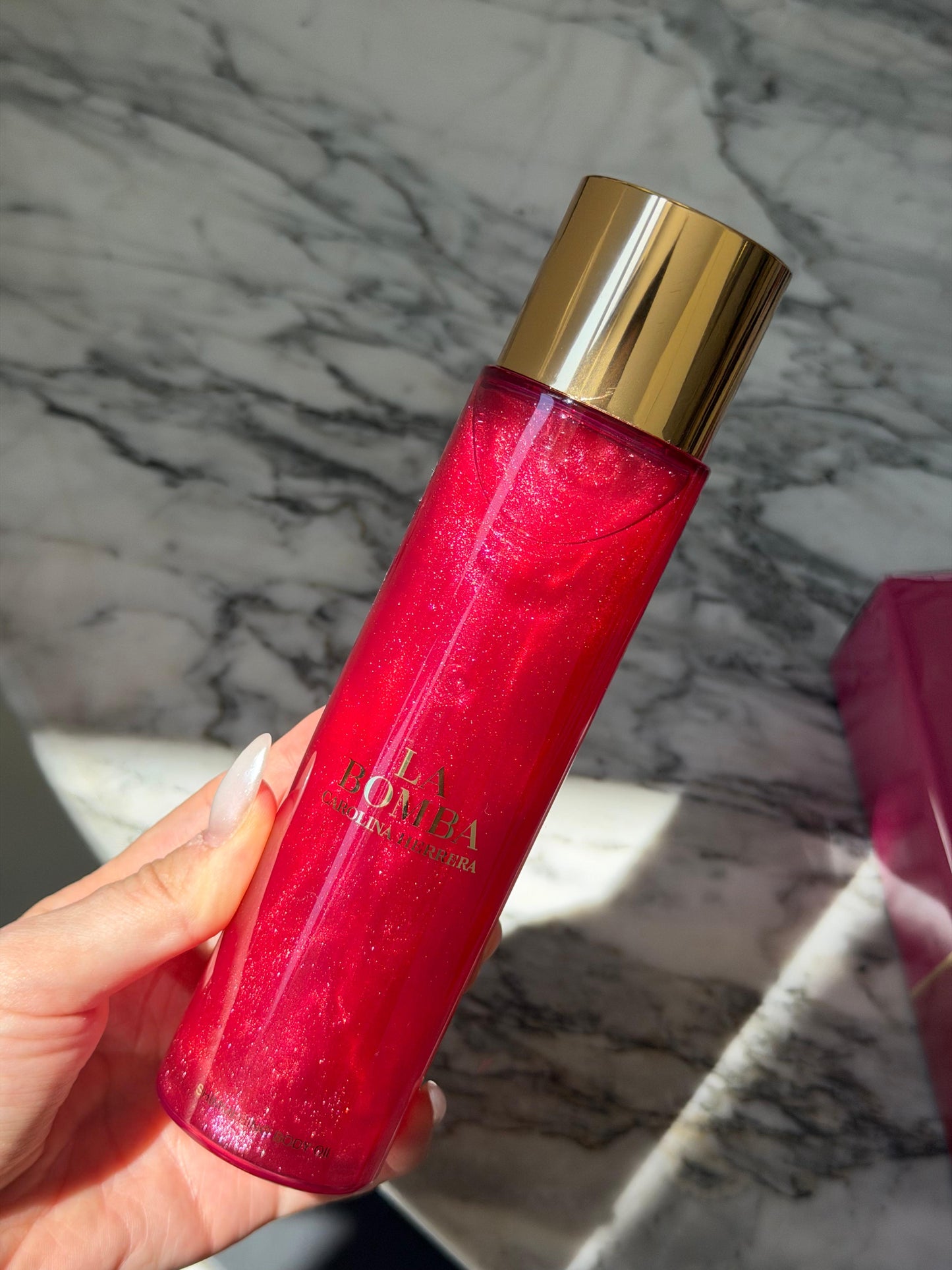 CAROLINA HERRERA La Bomba Shimmering Body Oil