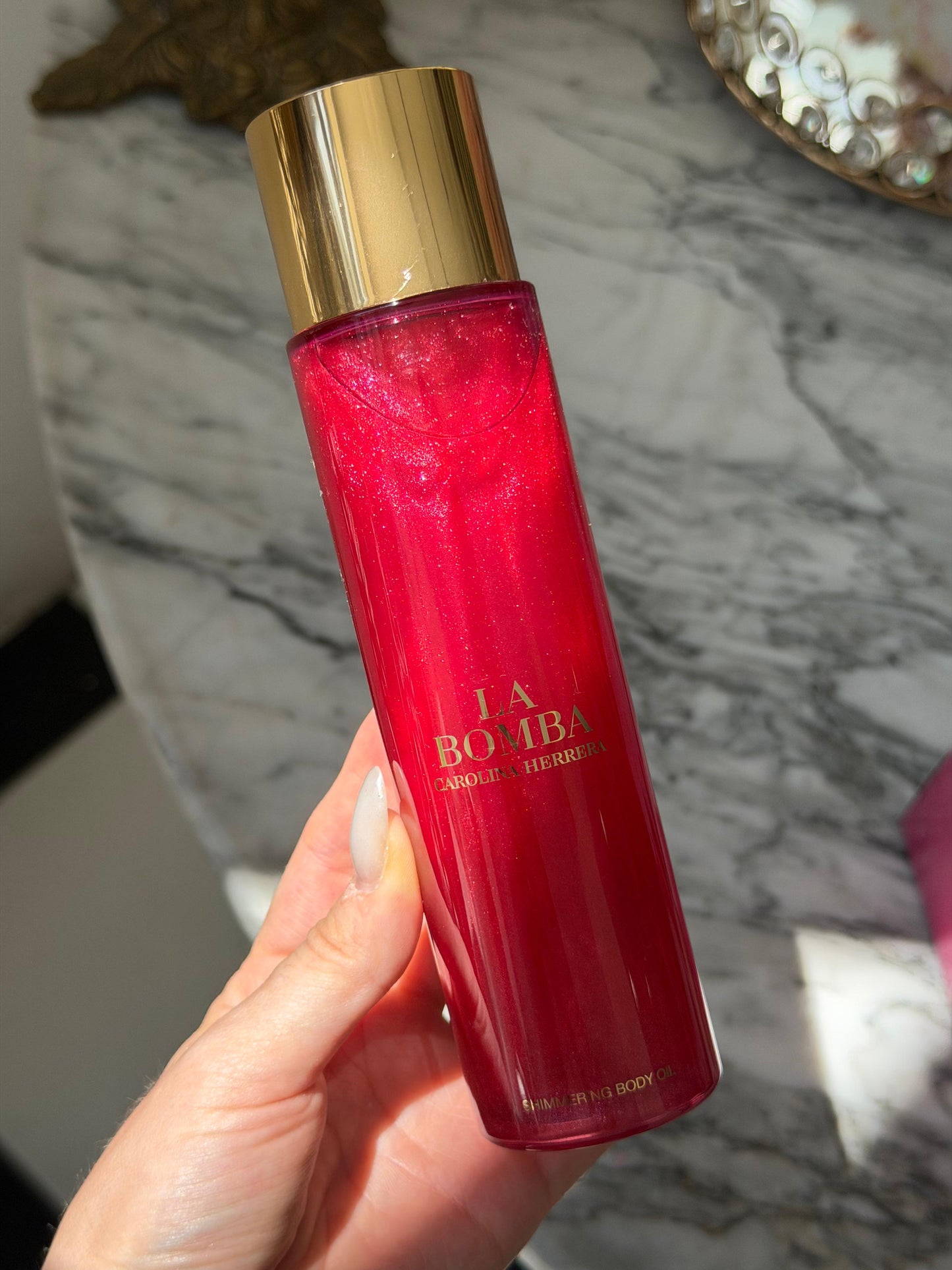 CAROLINA HERRERA La Bomba Shimmering Body Oil