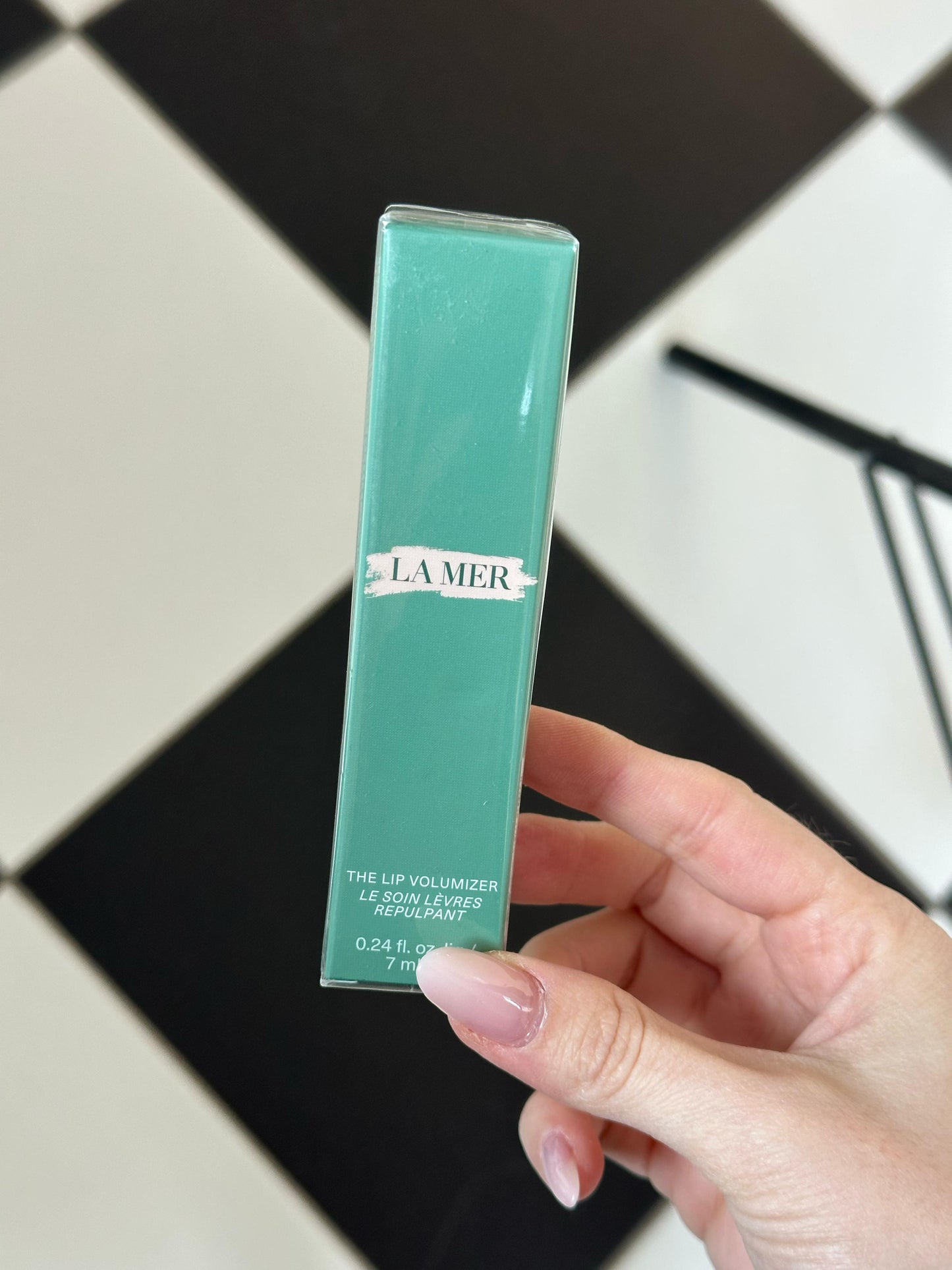 LA MER The Lip Volumizer
Plumping Lip Gloss