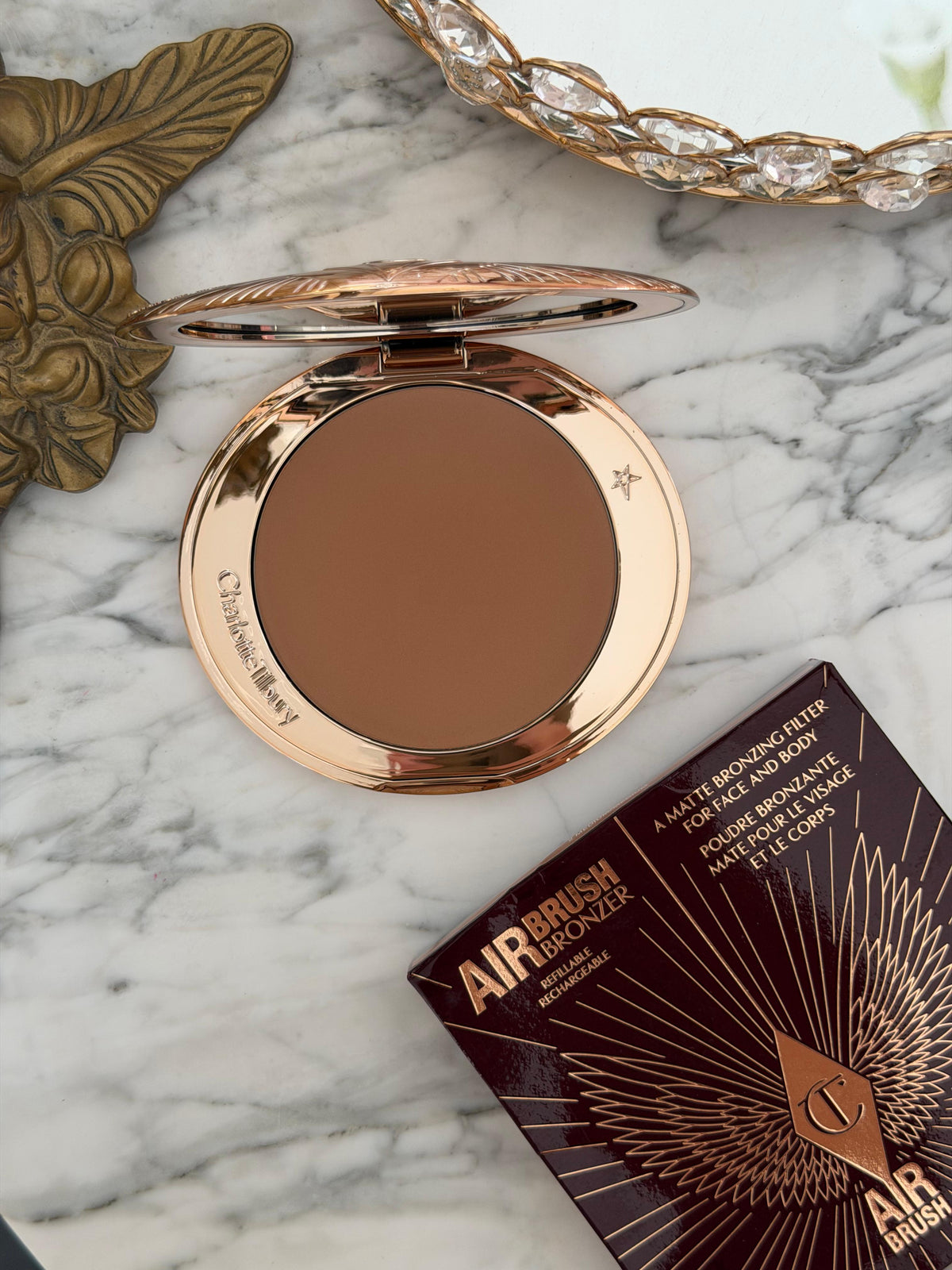CHARLOTTE TILBURY Airbrush Bronzer (2)
Matte Bronzing Filter For Face And Body