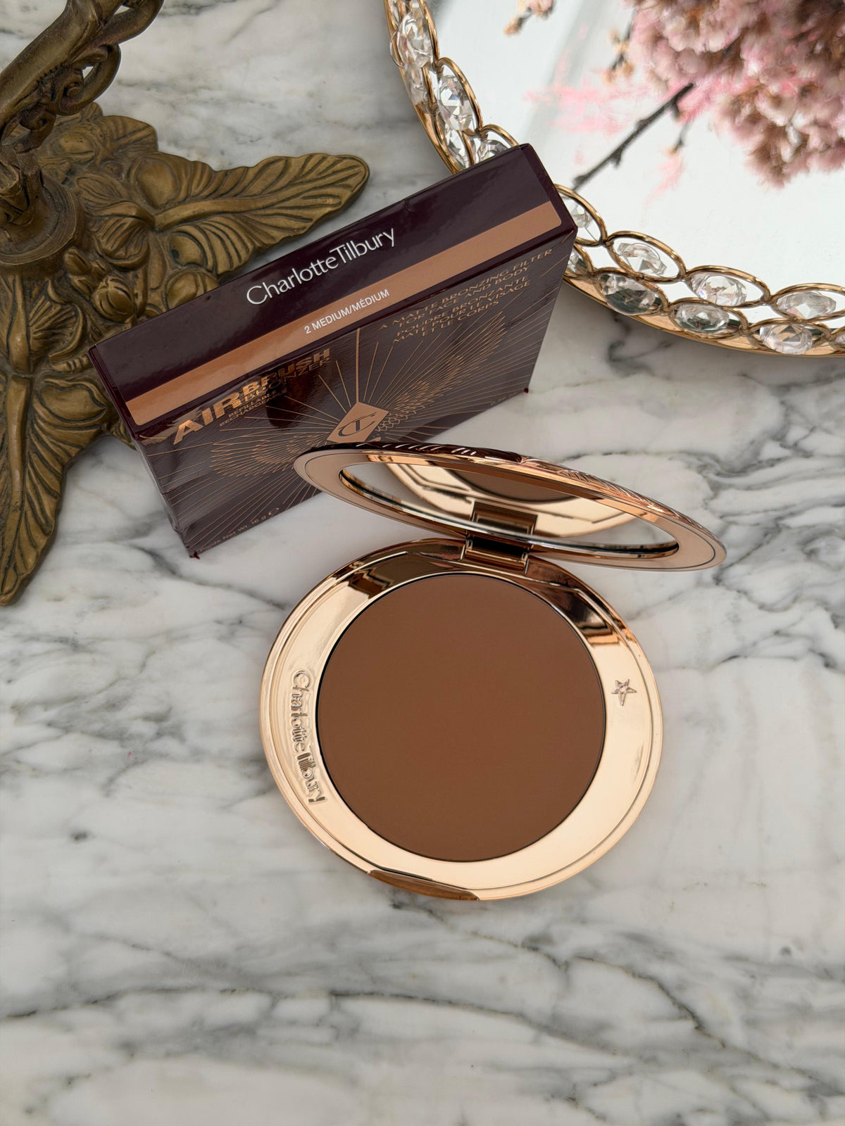 CHARLOTTE TILBURY Airbrush Bronzer (2)
Matte Bronzing Filter For Face And Body