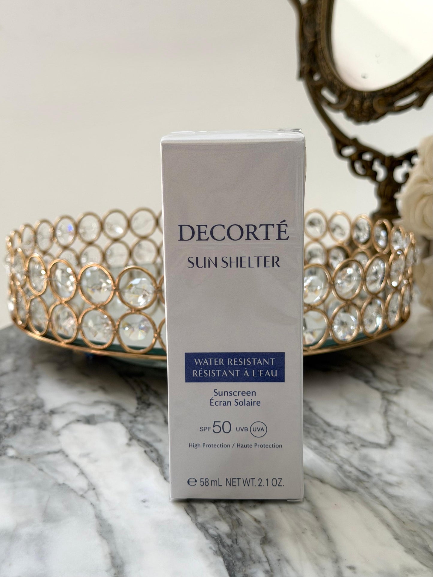 DECORTÉ Sun Shelter SPF50+ UVB
Multi Protection Water Resistant