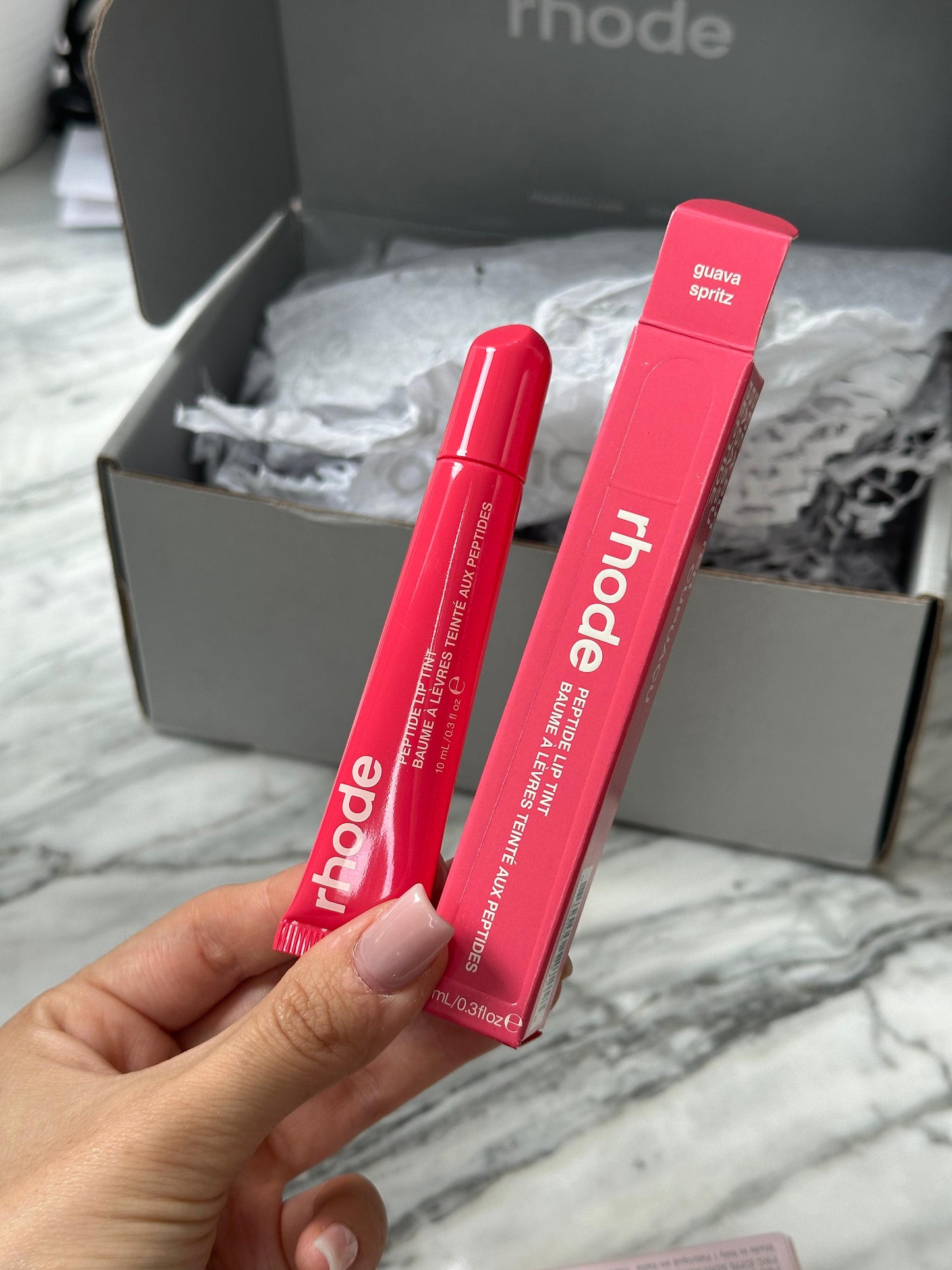 RHODE Peptide Lip Tint
The Tinted Lip Layer - Guava Spritz