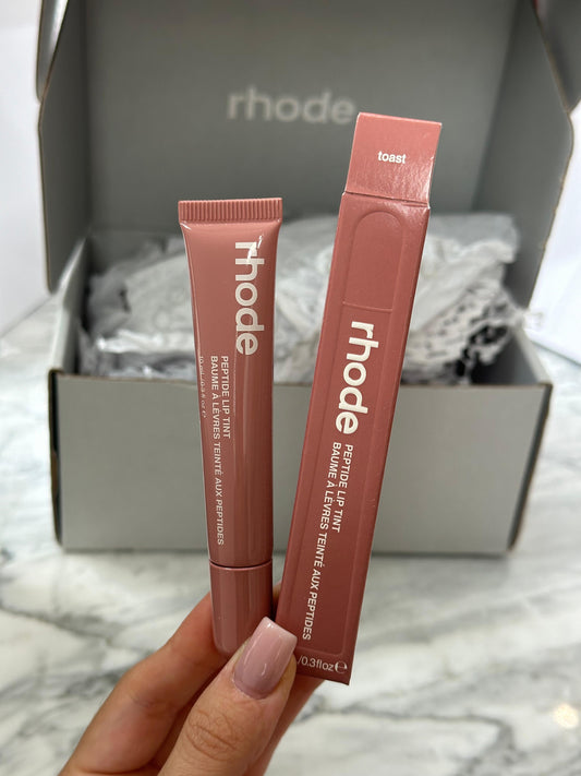 RHODE Peptide Lip Tint
The Tinted Lip Layer - Toast