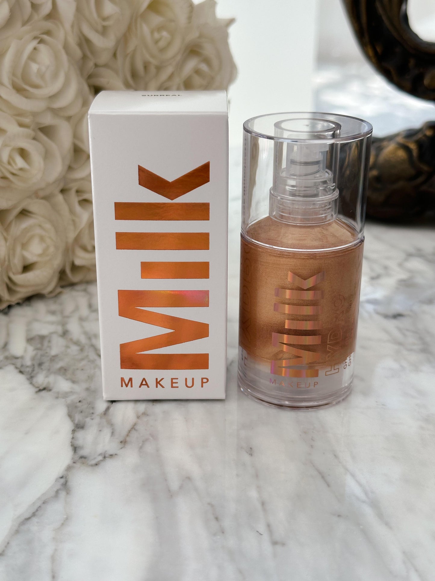 MILK MAKEUP Hydro Grip + Glow Primer
Illuminating Primer