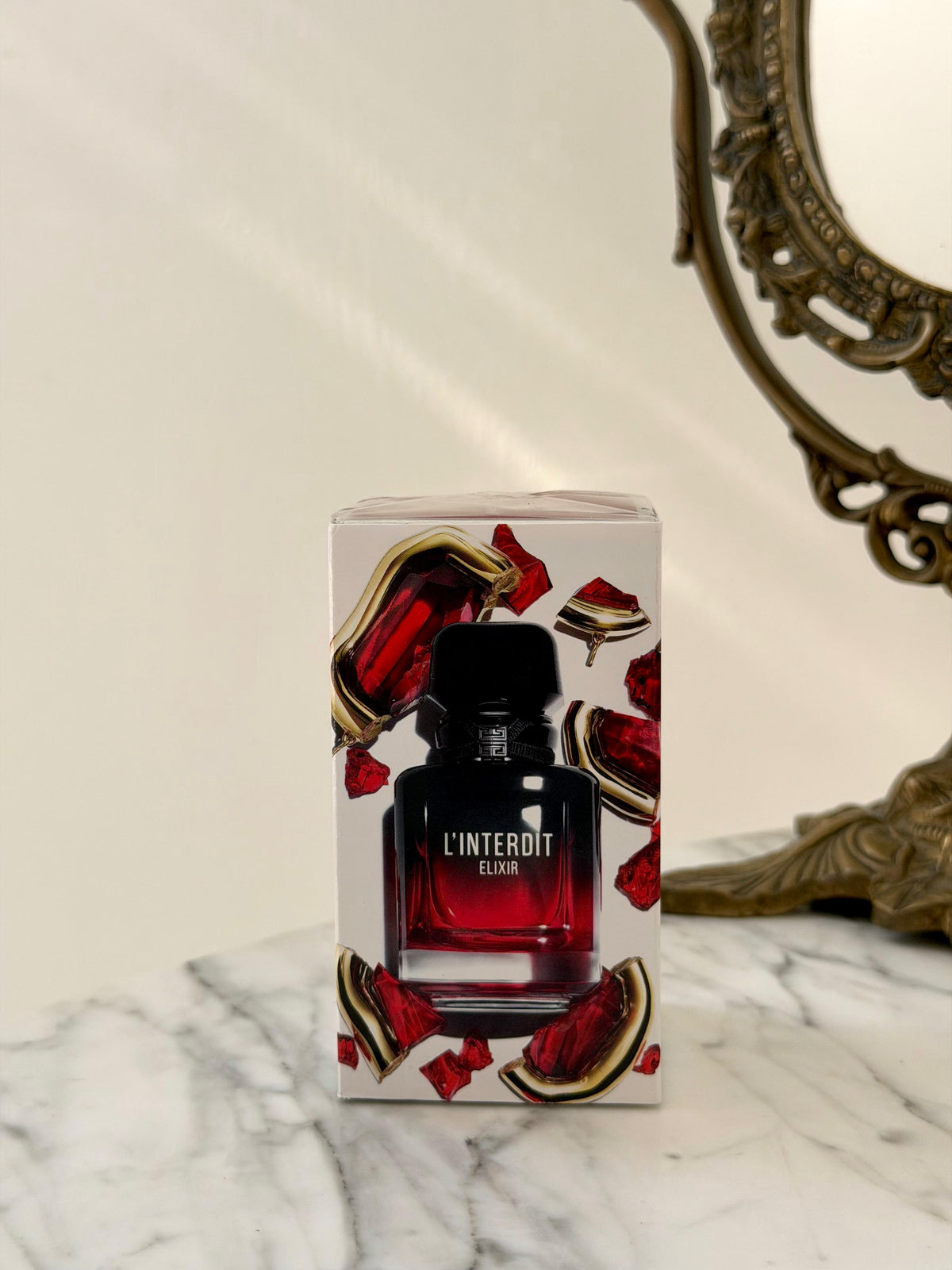 GIVENCHY L’Interdit Elixir Parfum Concentré
Floral, Woody, Gourmand
