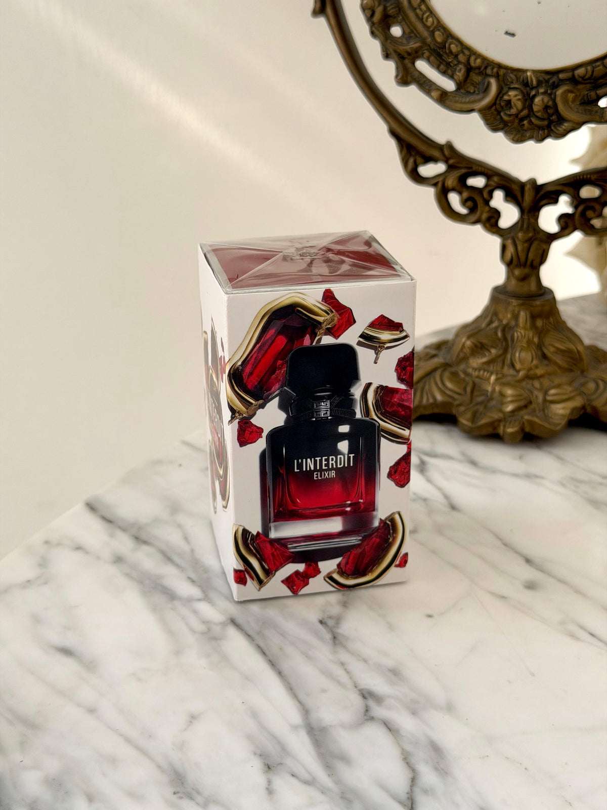 GIVENCHY L’Interdit Elixir Parfum Concentré
Floral, Woody, Gourmand