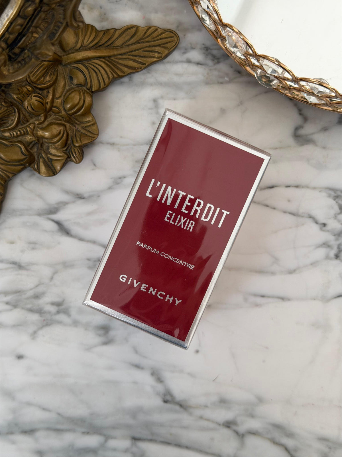 GIVENCHY L’Interdit Elixir Parfum Concentré
Floral, Woody, Gourmand