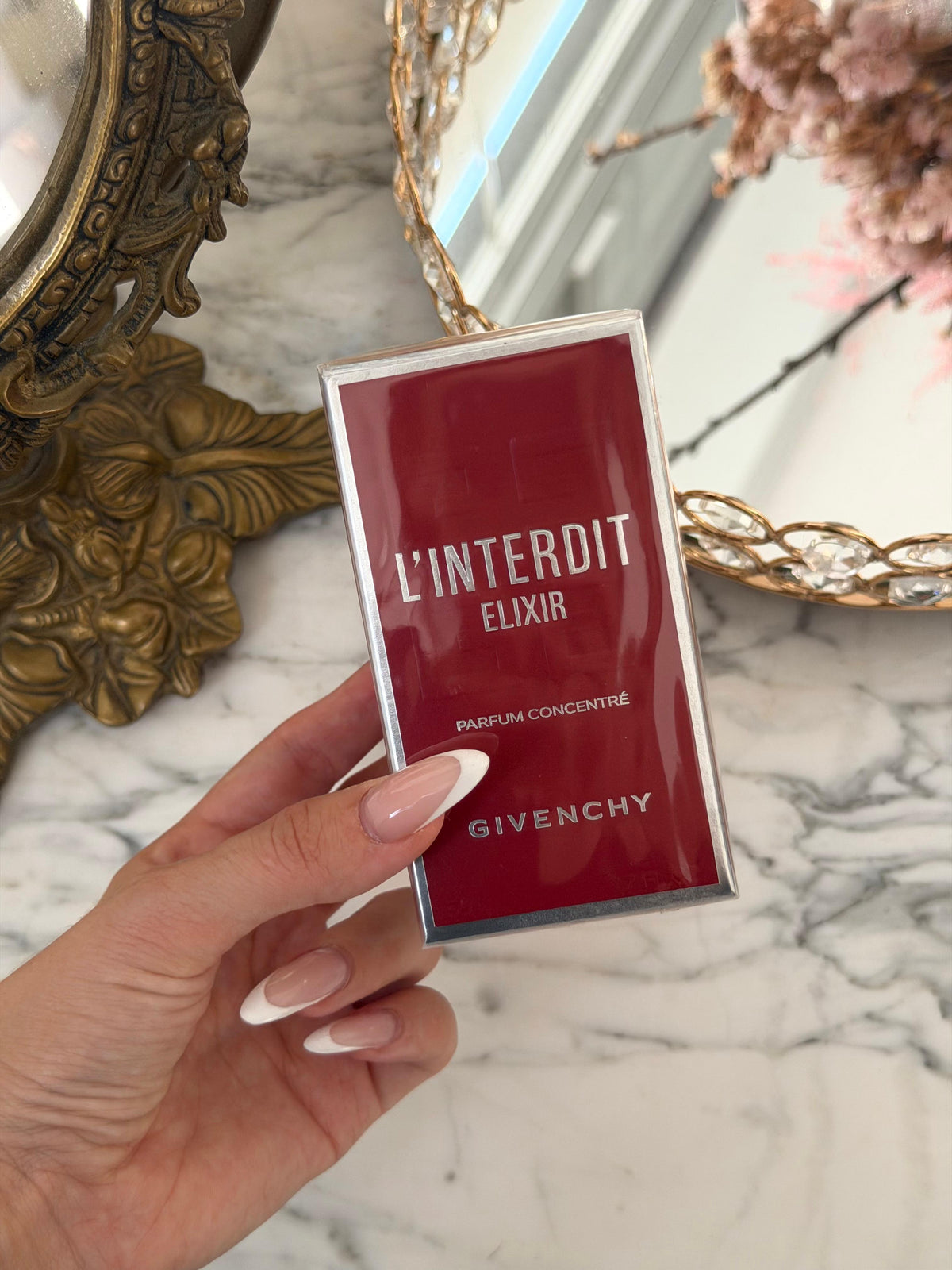 GIVENCHY L’Interdit Elixir Parfum Concentré
Floral, Woody, Gourmand