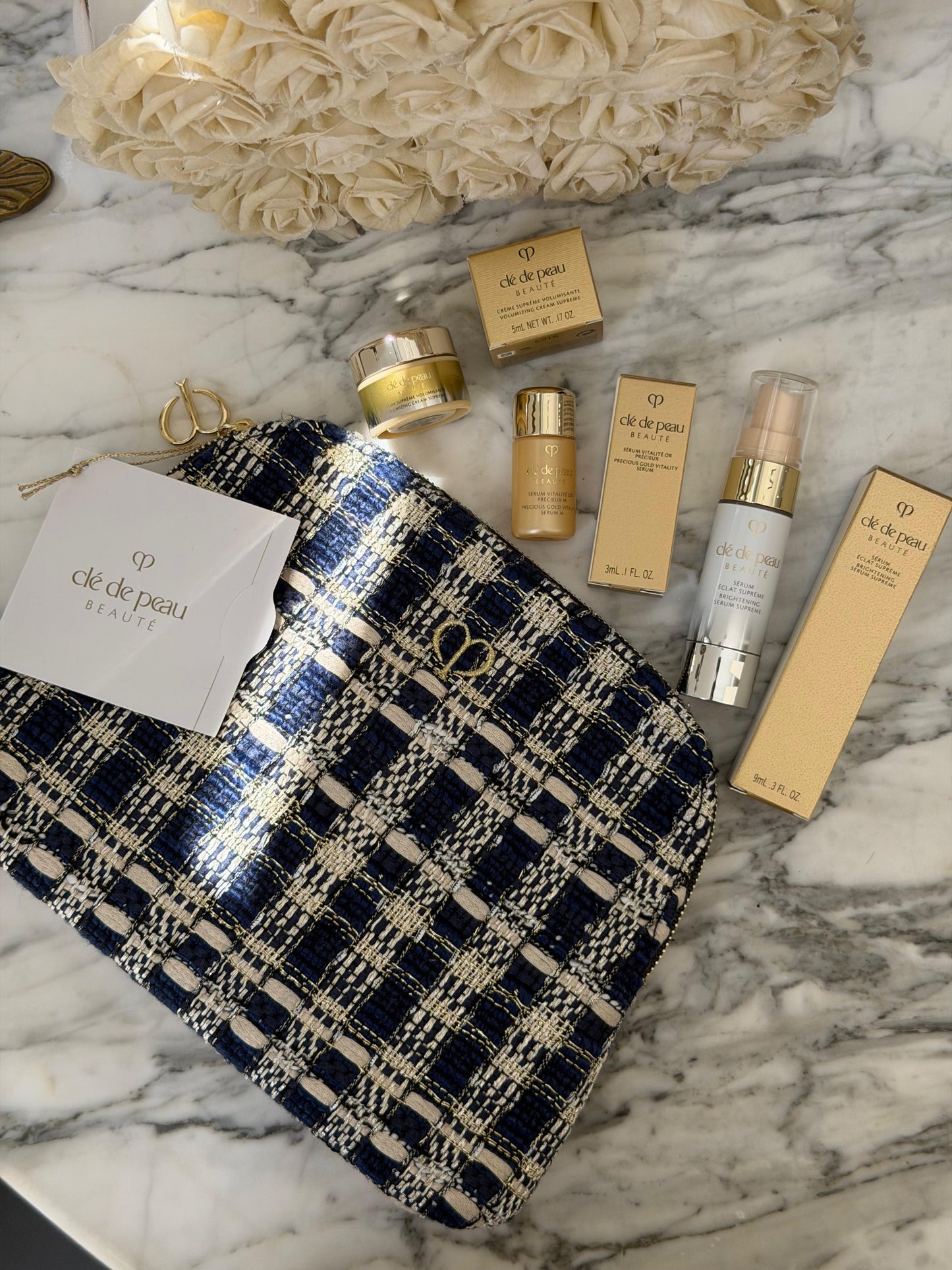 CLE DE PEAU
Beauty Pouch Gift Mini Set (2 Serum + Cream Supreme)
