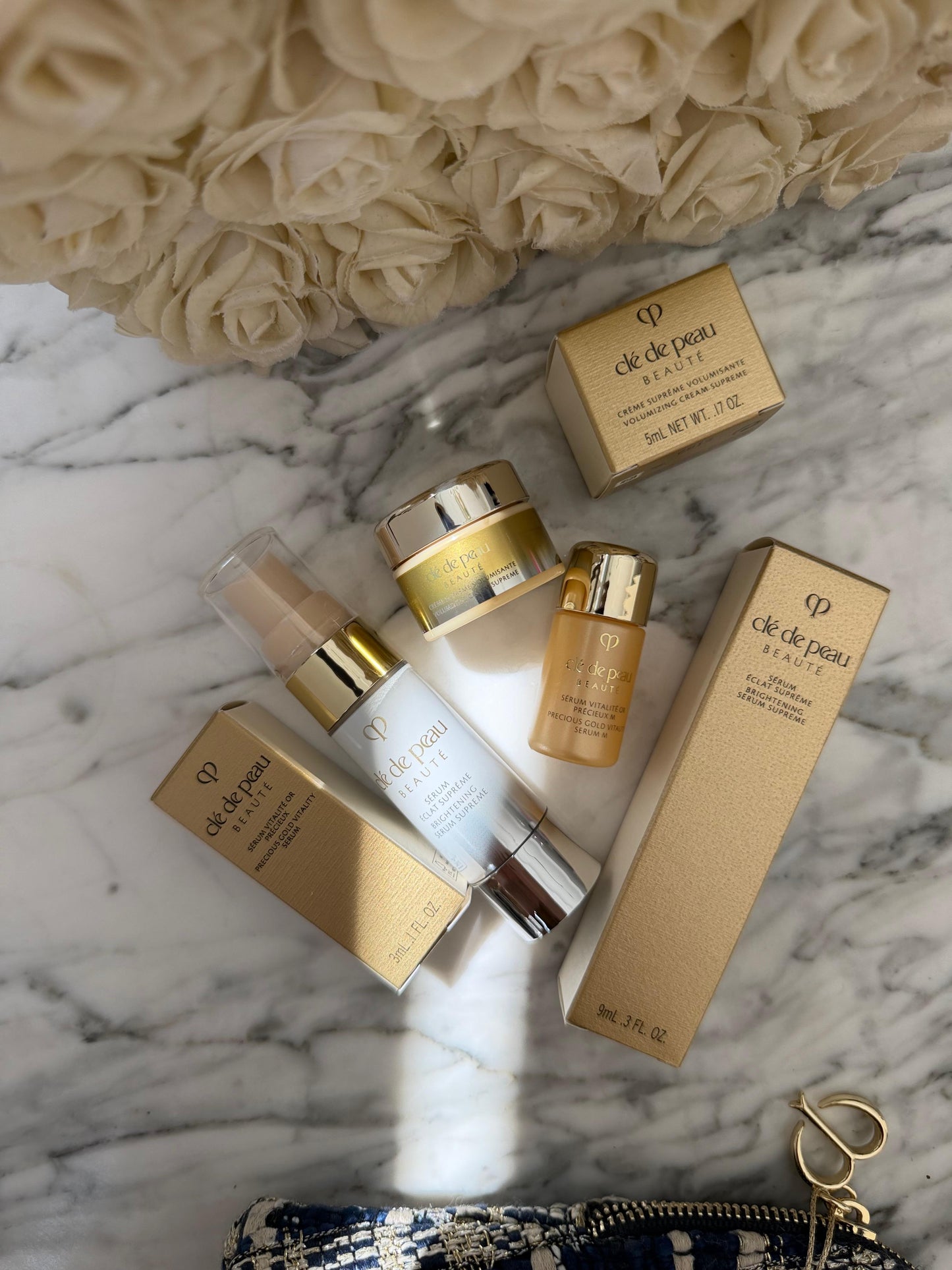CLE DE PEAU
Beauty Pouch Gift Mini Set (2 Serum + Cream Supreme)