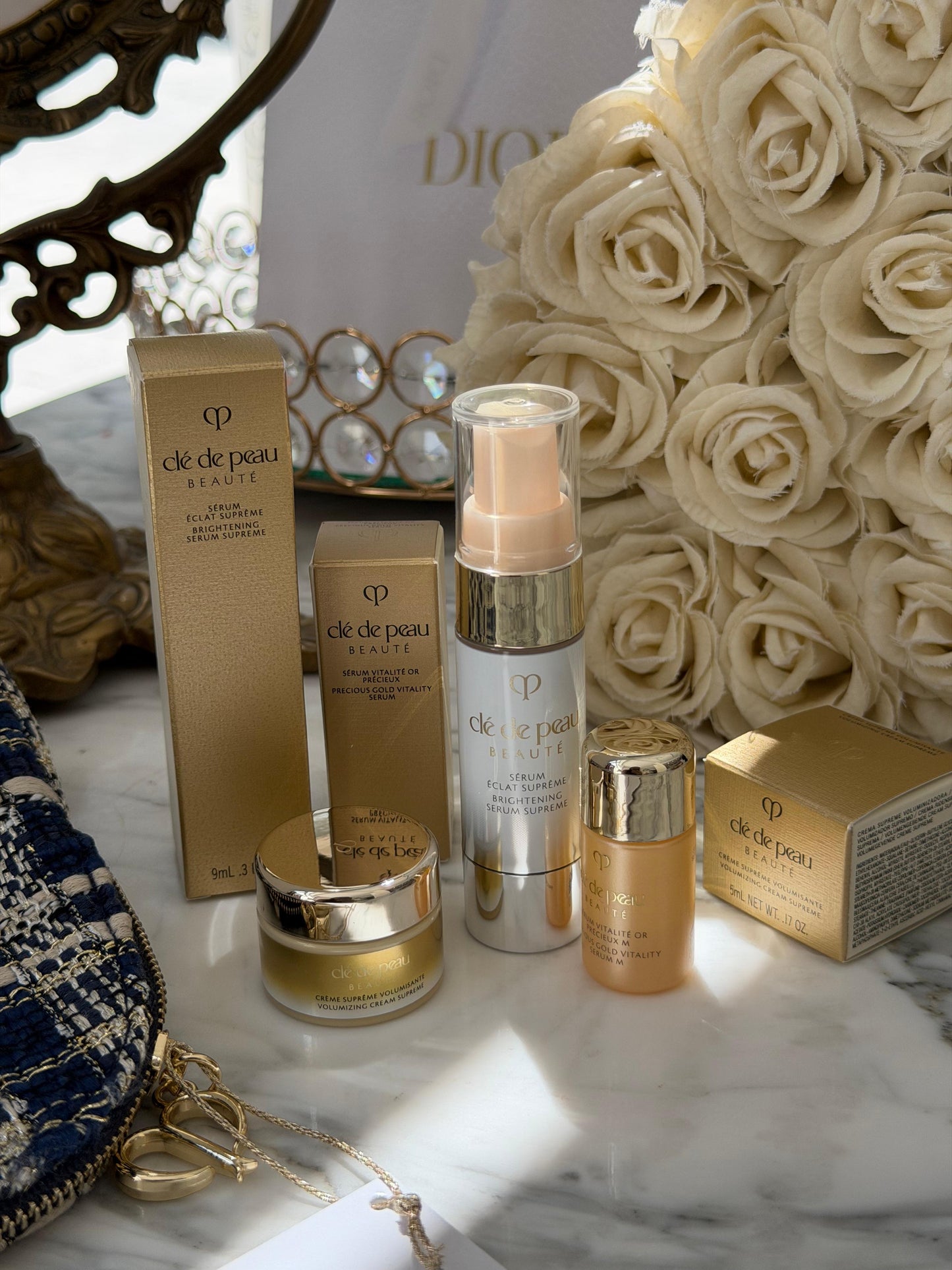 CLE DE PEAU
Beauty Pouch Gift Mini Set (2 Serum + Cream Supreme)
