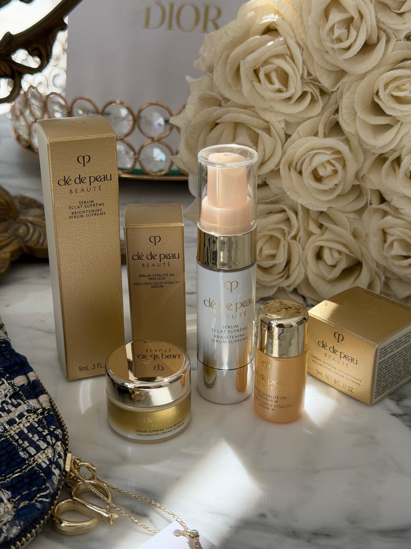 CLE DE PEAU
Beauty Pouch Gift Mini Set (2 Serum + Cream Supreme)