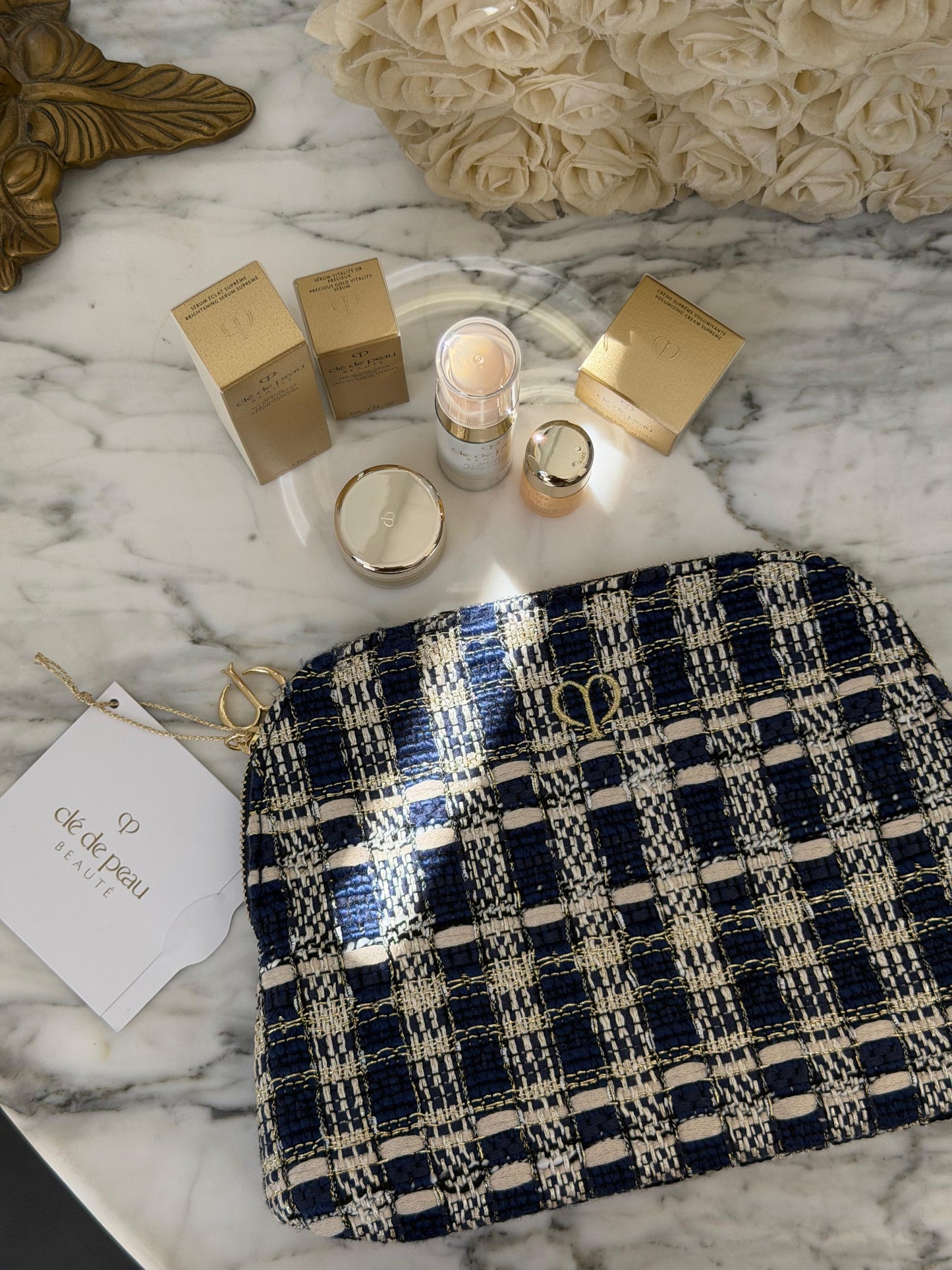 CLE DE PEAU
Beauty Pouch Gift Mini Set (2 Serum + Cream Supreme)