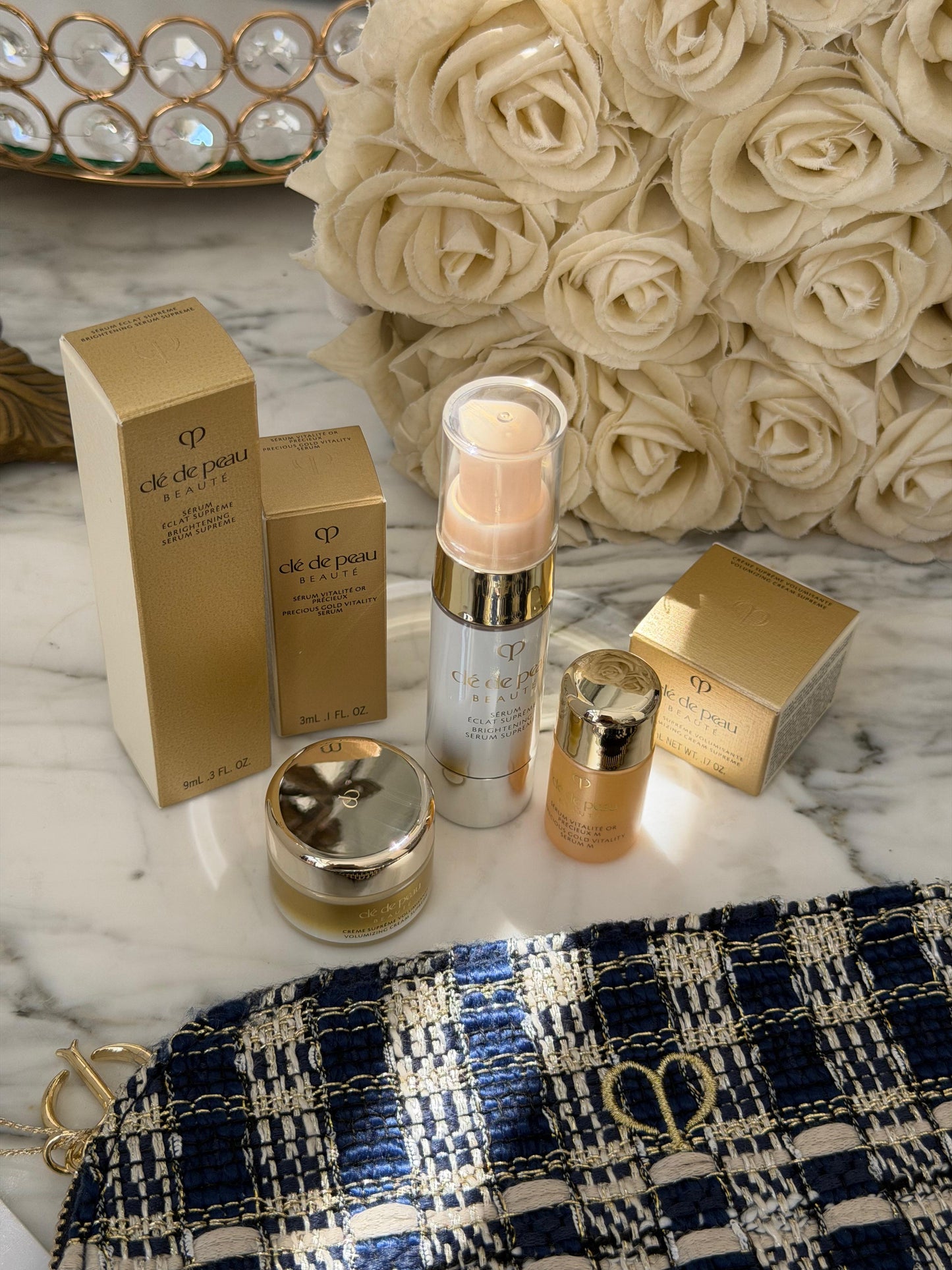 CLE DE PEAU
Beauty Pouch Gift Mini Set (2 Serum + Cream Supreme)