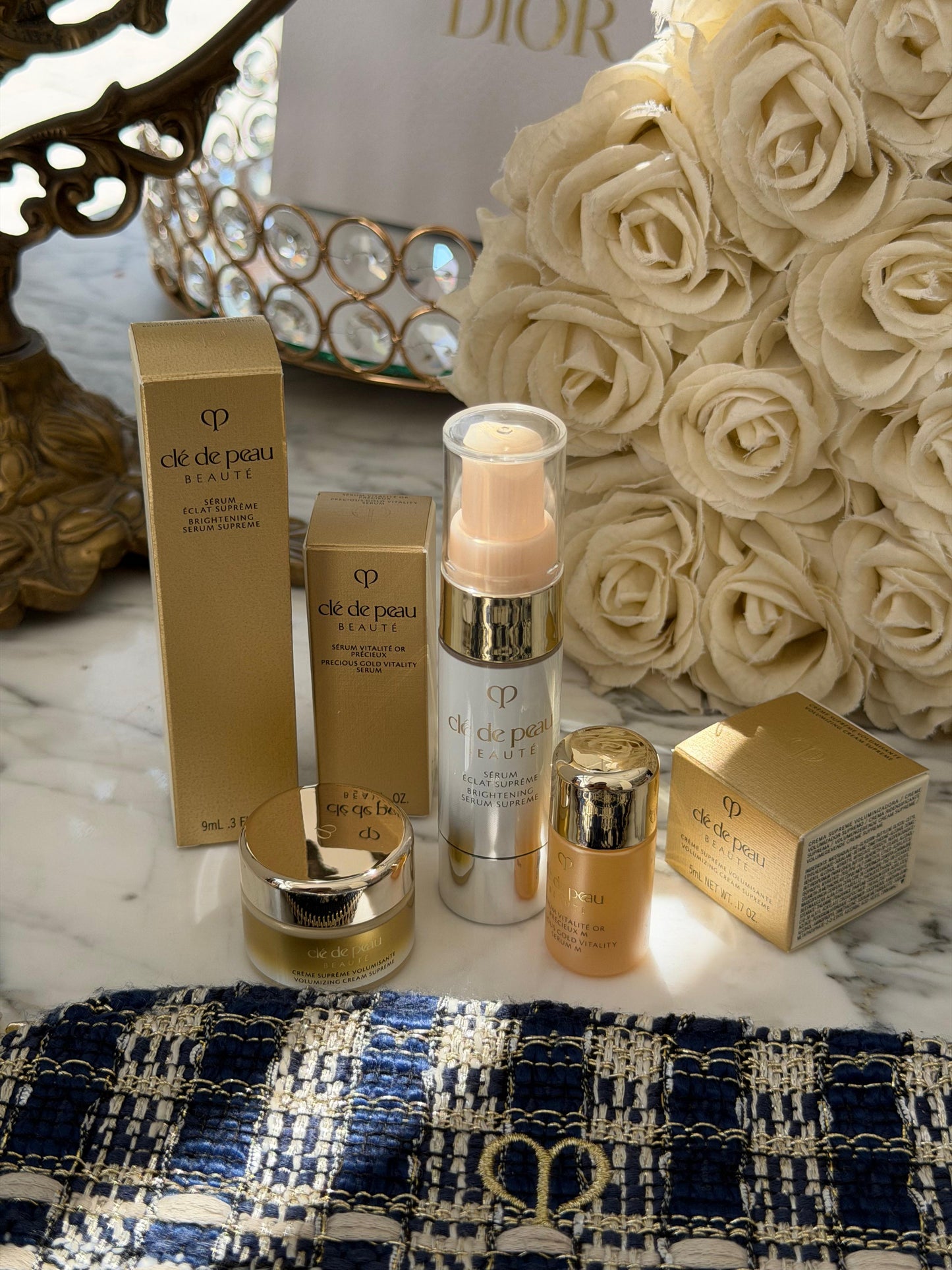 CLE DE PEAU
Beauty Pouch Gift Mini Set (2 Serum + Cream Supreme)