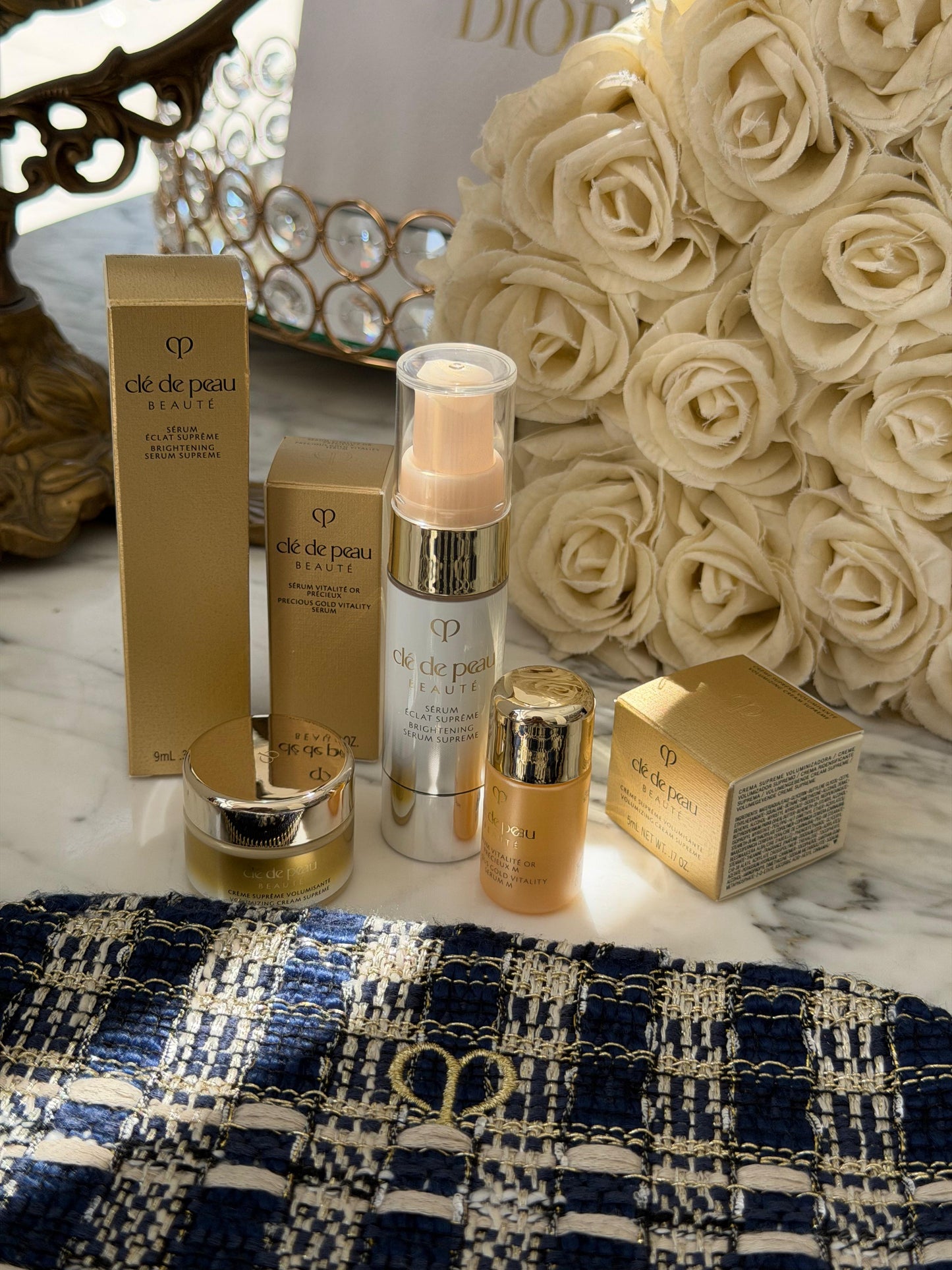 CLE DE PEAU
Beauty Pouch Gift Mini Set (2 Serum + Cream Supreme)