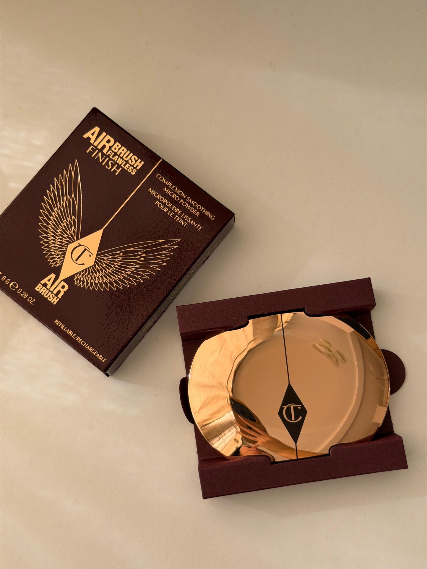 CHARLOTTE TILBURY Airbrush Flawless Finish (1)
Complexion Perfecting Micro Powder