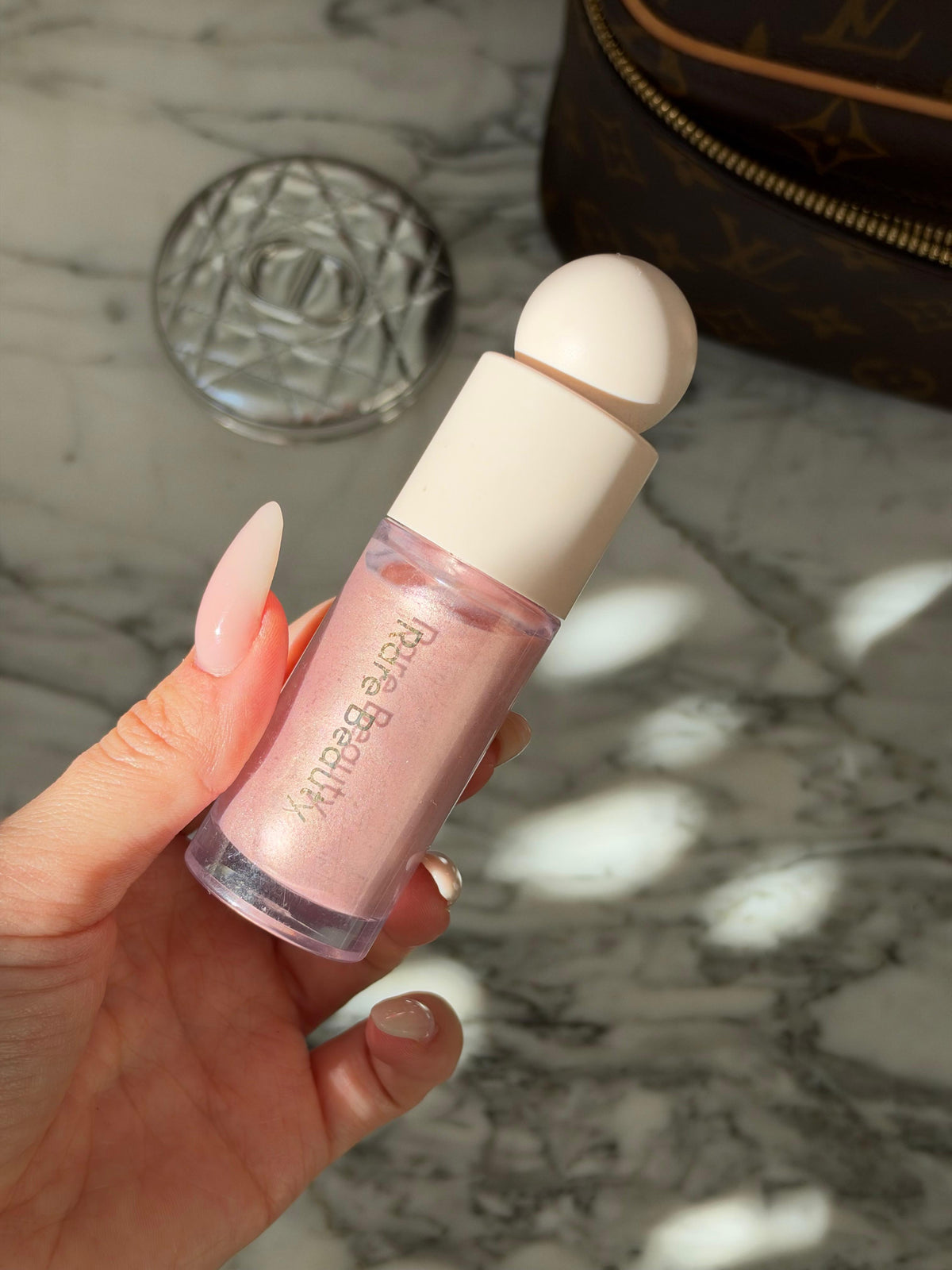 RARE BEAUTY Positive Light Liquid Luminizer - Enchant