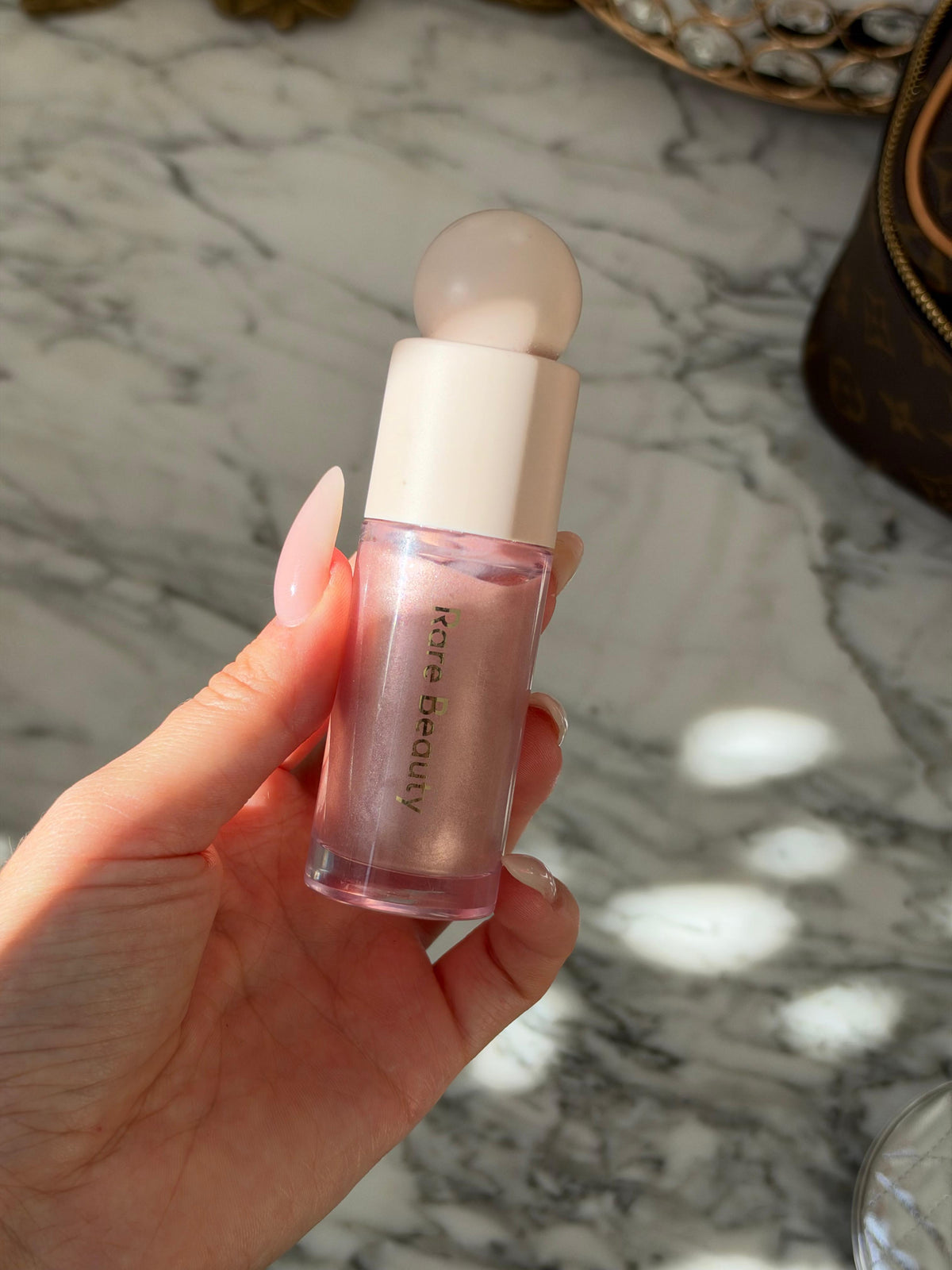 RARE BEAUTY Positive Light Liquid Luminizer - Enchant