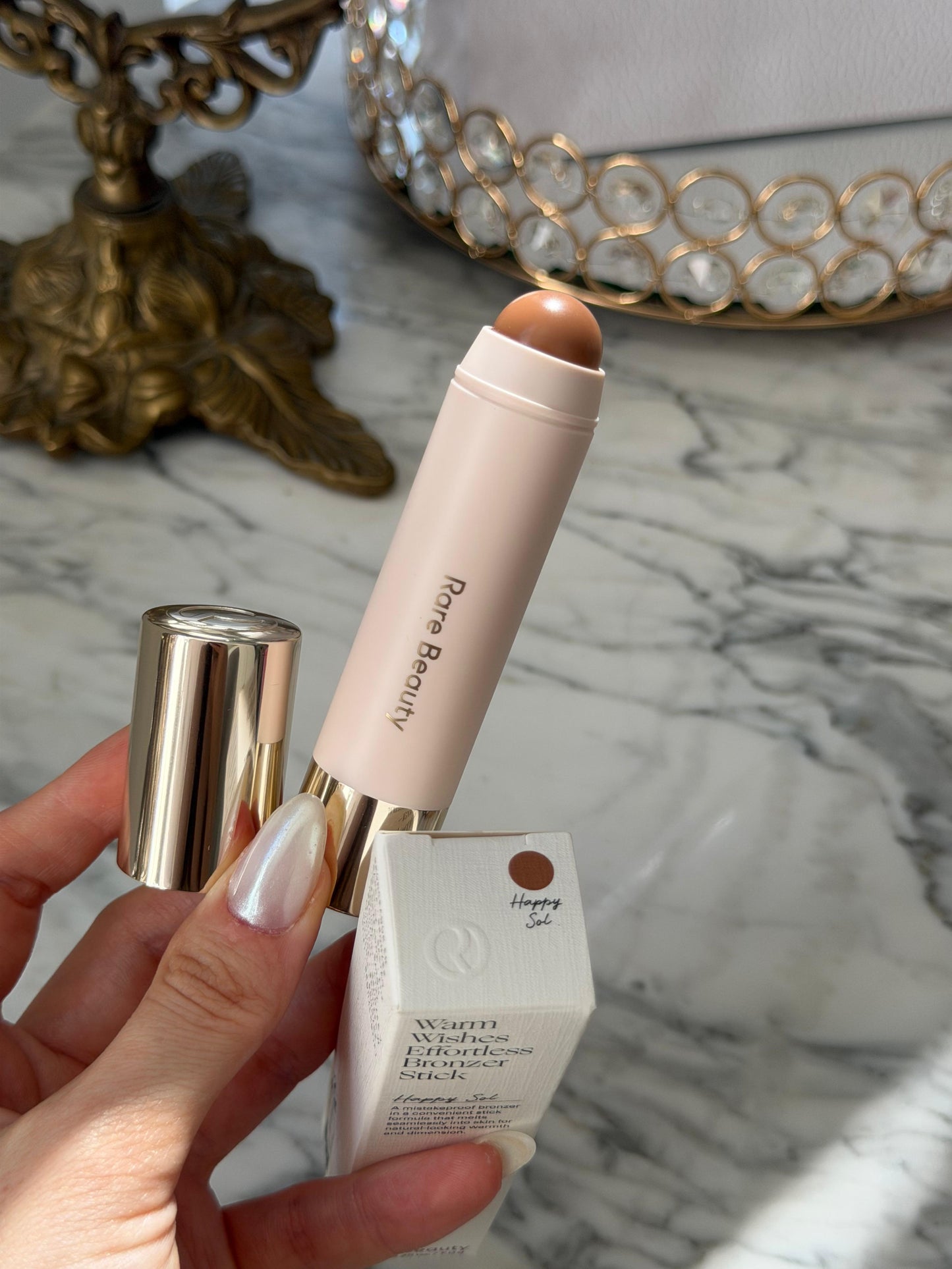 RARE BEAUTY Warm Wishes Effortless Bronzer Stick - Happy Sol