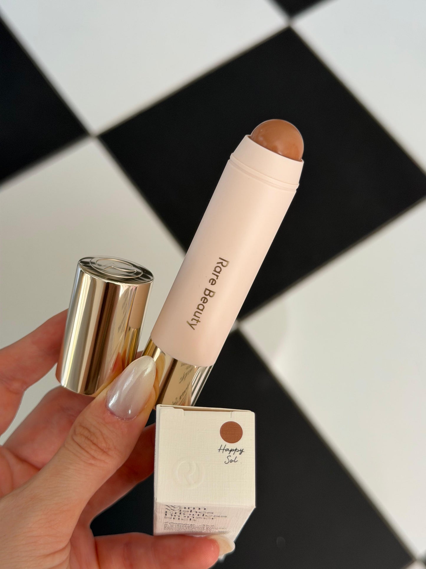RARE BEAUTY Warm Wishes Effortless Bronzer Stick - Happy Sol